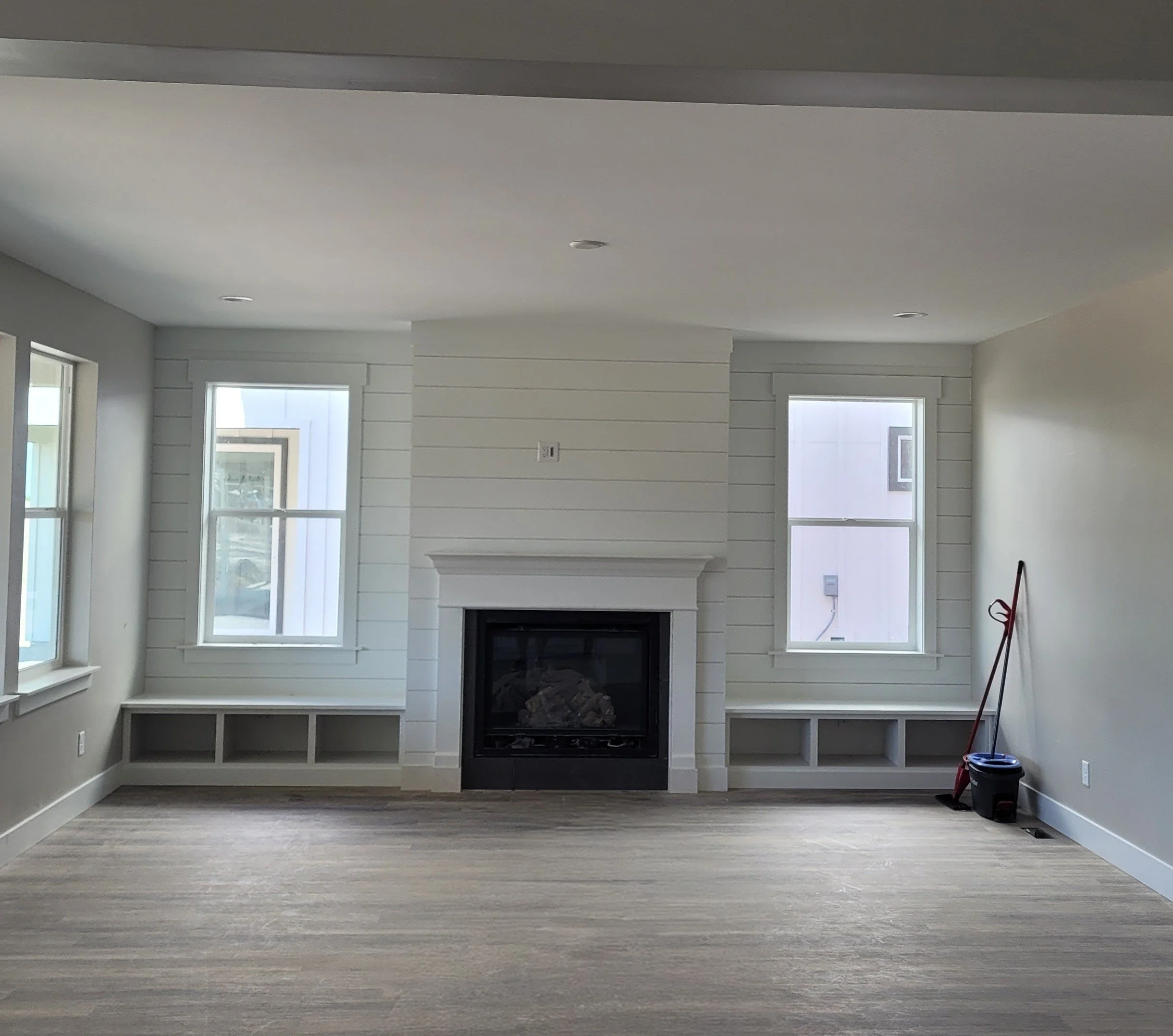 Horizontal shiplap, fireplace accent trim, jamb and case windows
