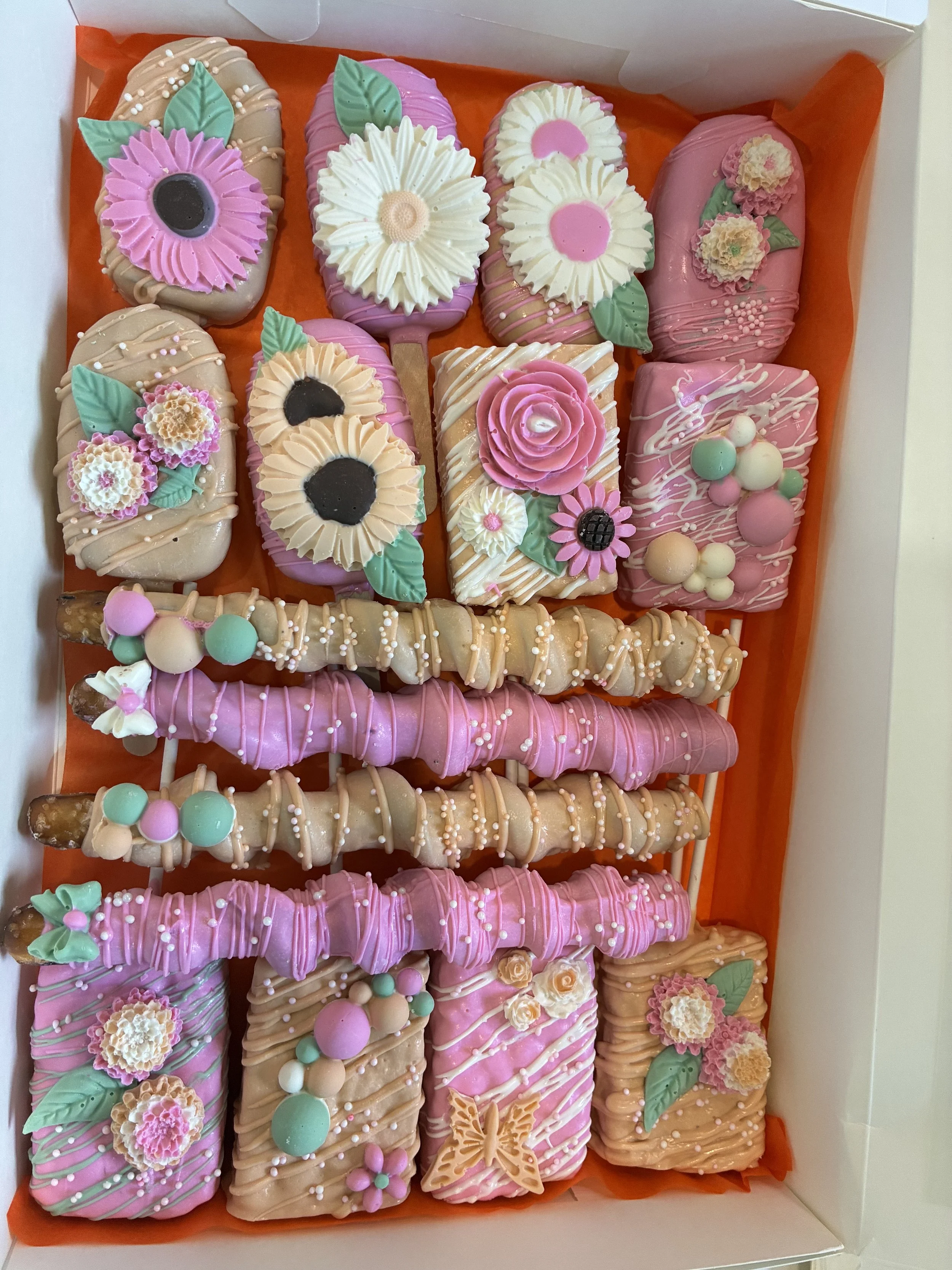 6 cakesicles, 6 rice krispies, 4 pretzels w/ caramel