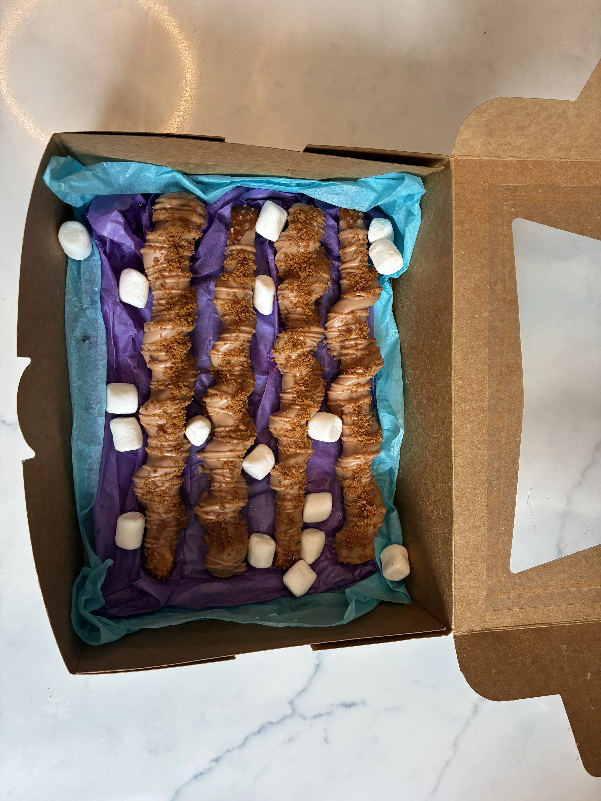 4 Biscoff pretzels w/ caramel 