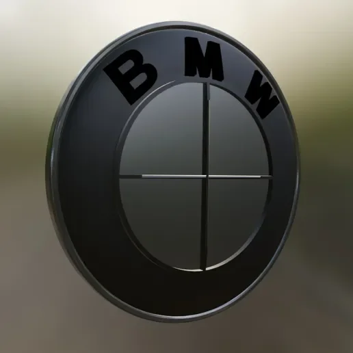Close-up of a black BMW logo with the brand's initials on a circular emblem.