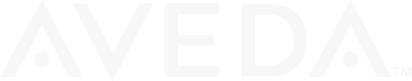 A black and white logo with the word 'AVEDA' in bold, stylized letters with dots between the letters.