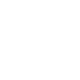 Silhouette of a lawnmower on grass