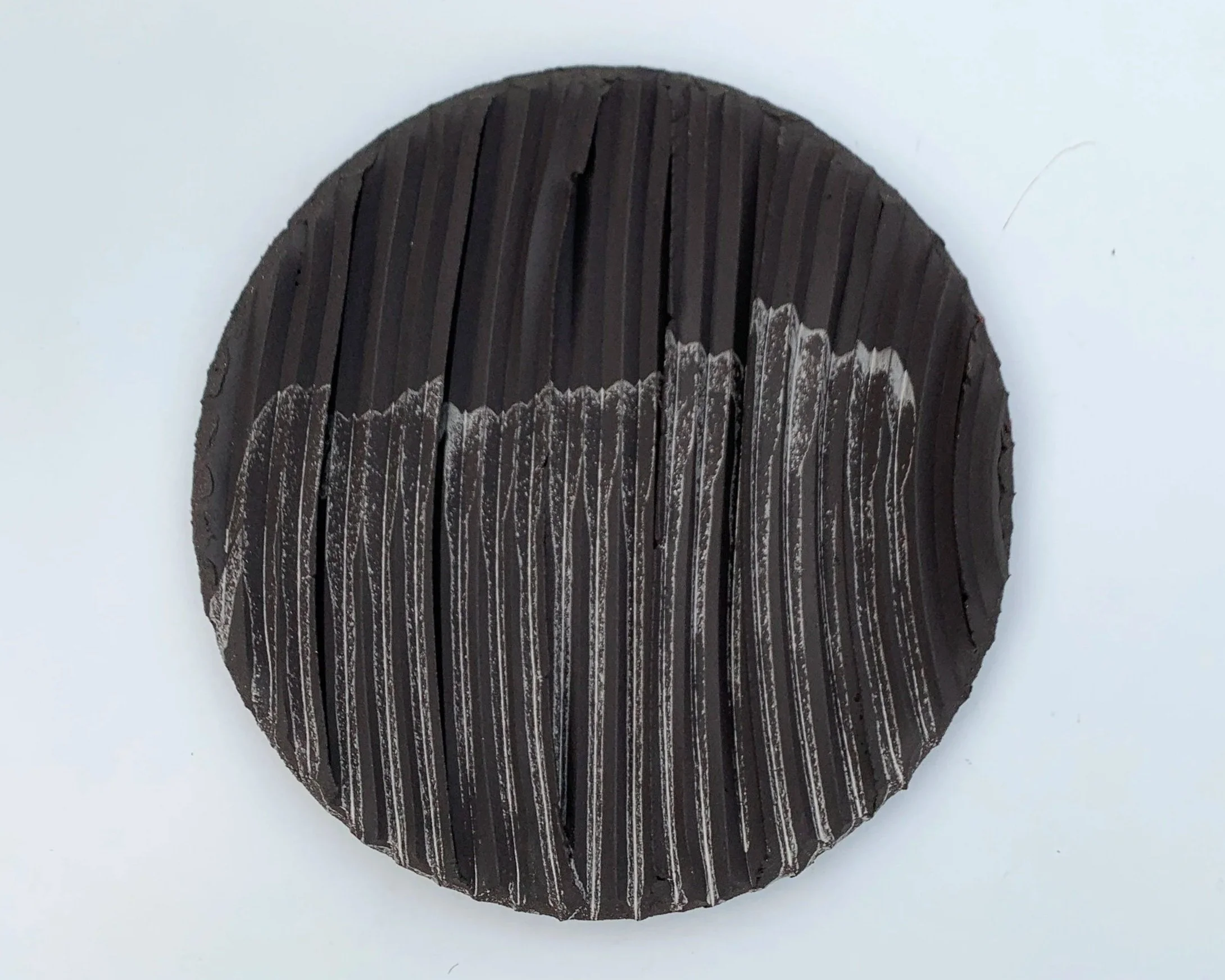 david+pye+black+circular+wall.jpg