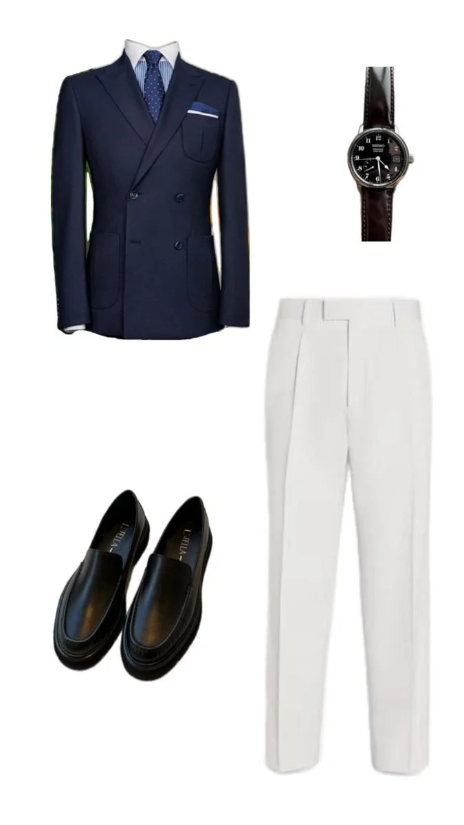 Men's formal outfit including a navy double-breasted blazer with a white dress shirt, blue patterned tie, white trousers, black slip-on shoes, and a black wristwatch with a leather strap.