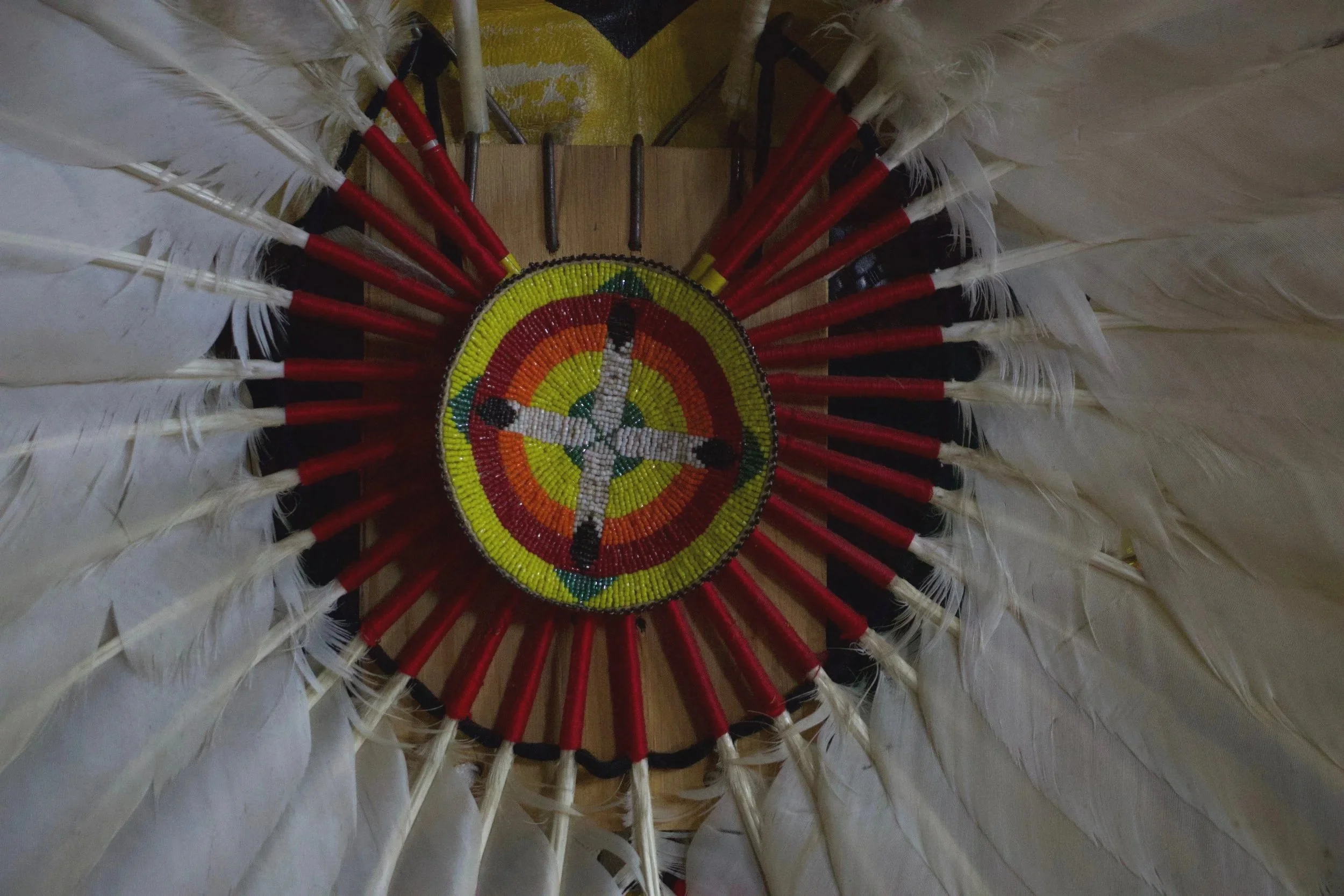 Detail shot of beaded and feathered regalia at the Carolina Indian Circle Pow Wow at the University of North Carolina at Chapel Hill on March 7th, 2026.