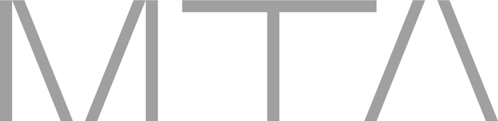 Close-up of a black surface with gray text that says 'VITAL'.