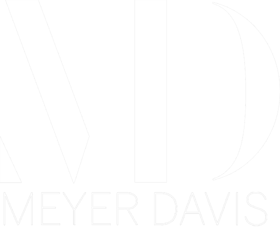 Black background with large white initials 'V' and 'D' and the words 'Meyer Davis' written below.