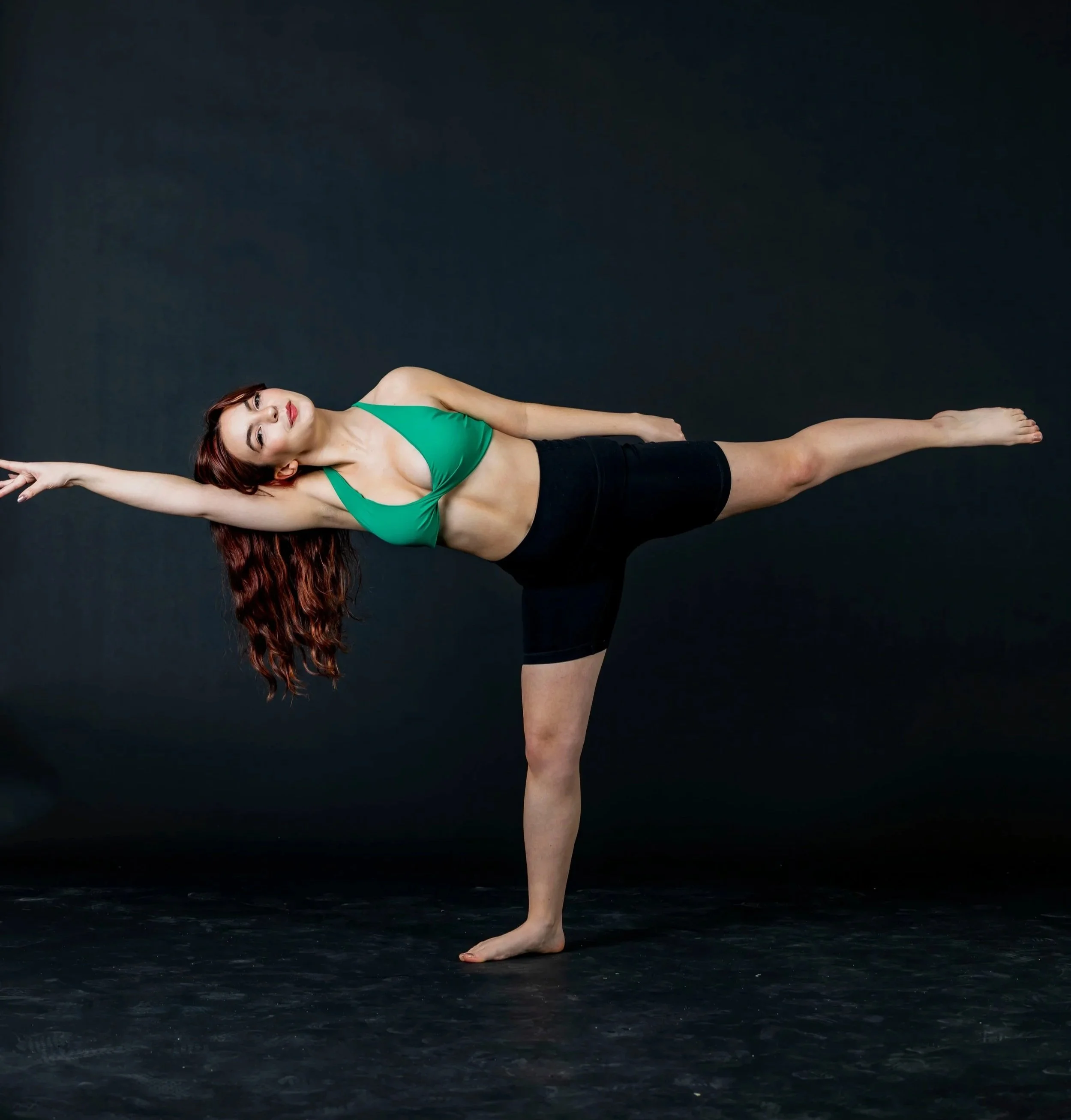 Chelsea is doing a tilt from her contemporary dance. 