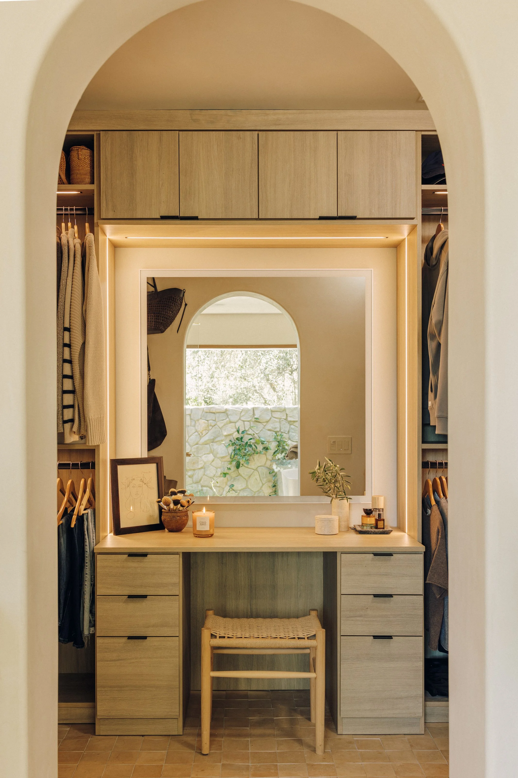 Dressing room with built-in vanity and storage