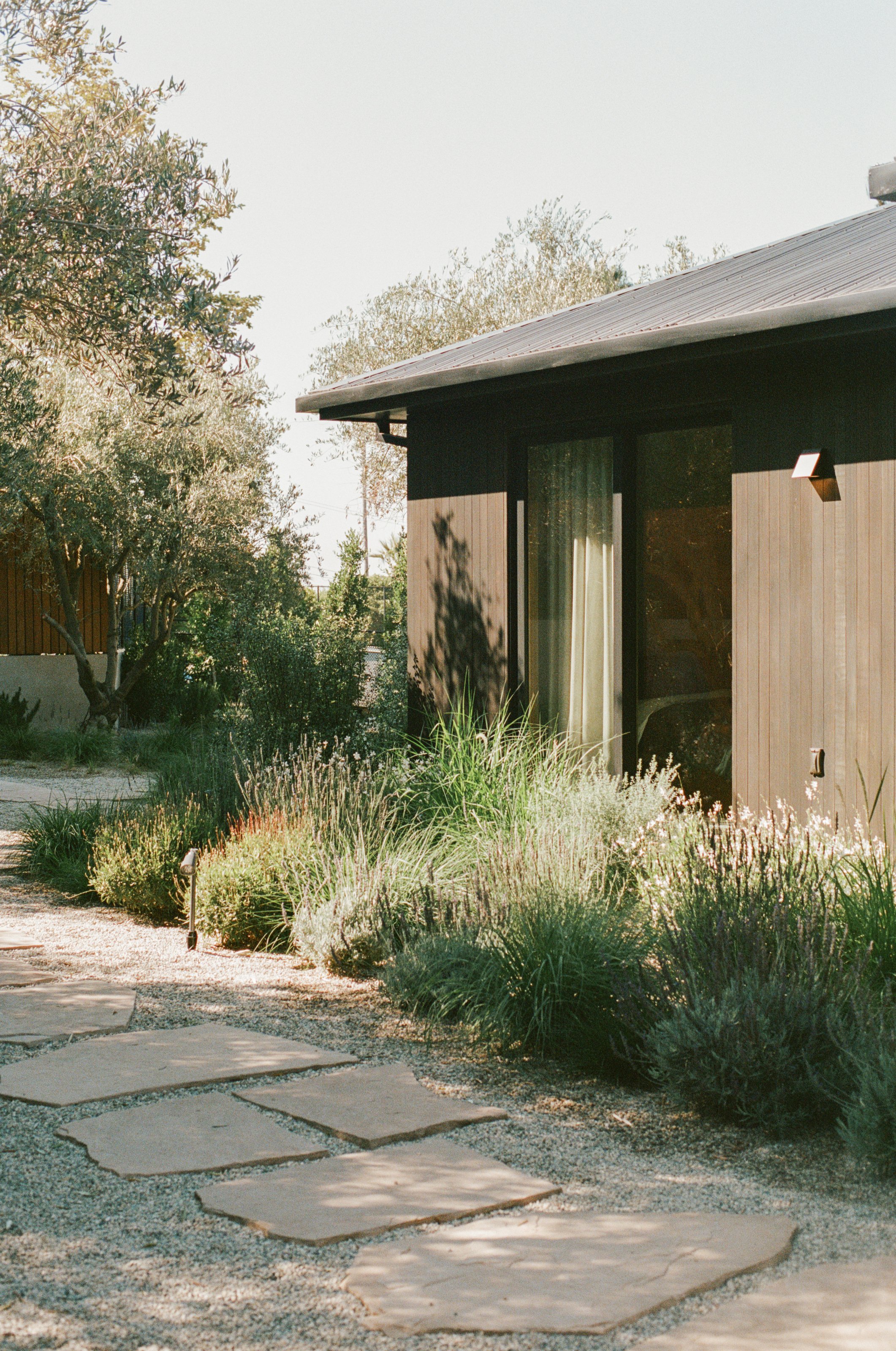 Side garden path and long exterior wall
