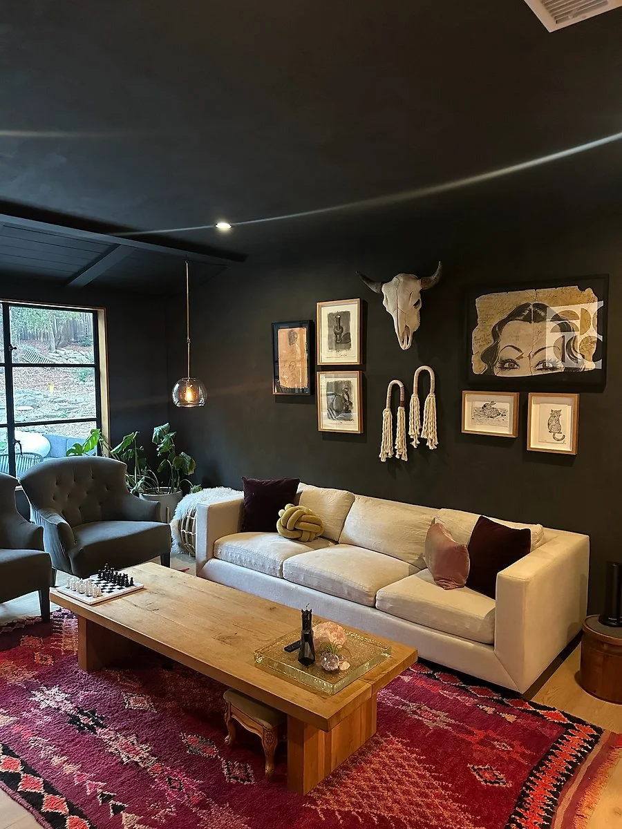 Second view of the dark sitting room and lounge seating. | PL-3803