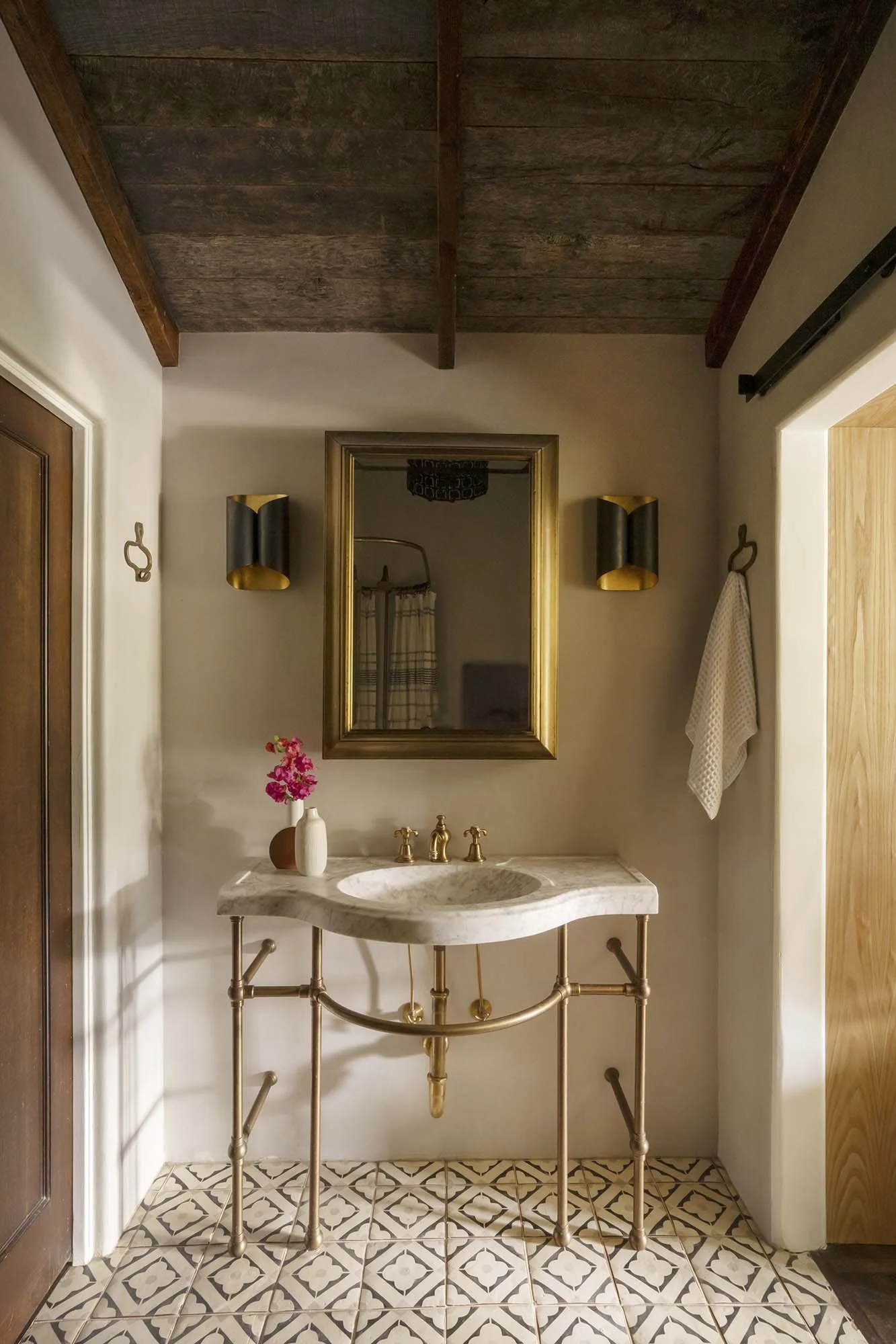 PL6014-026-bathroom-console-sink-brass-mirror-beamed-ceiling.jpg