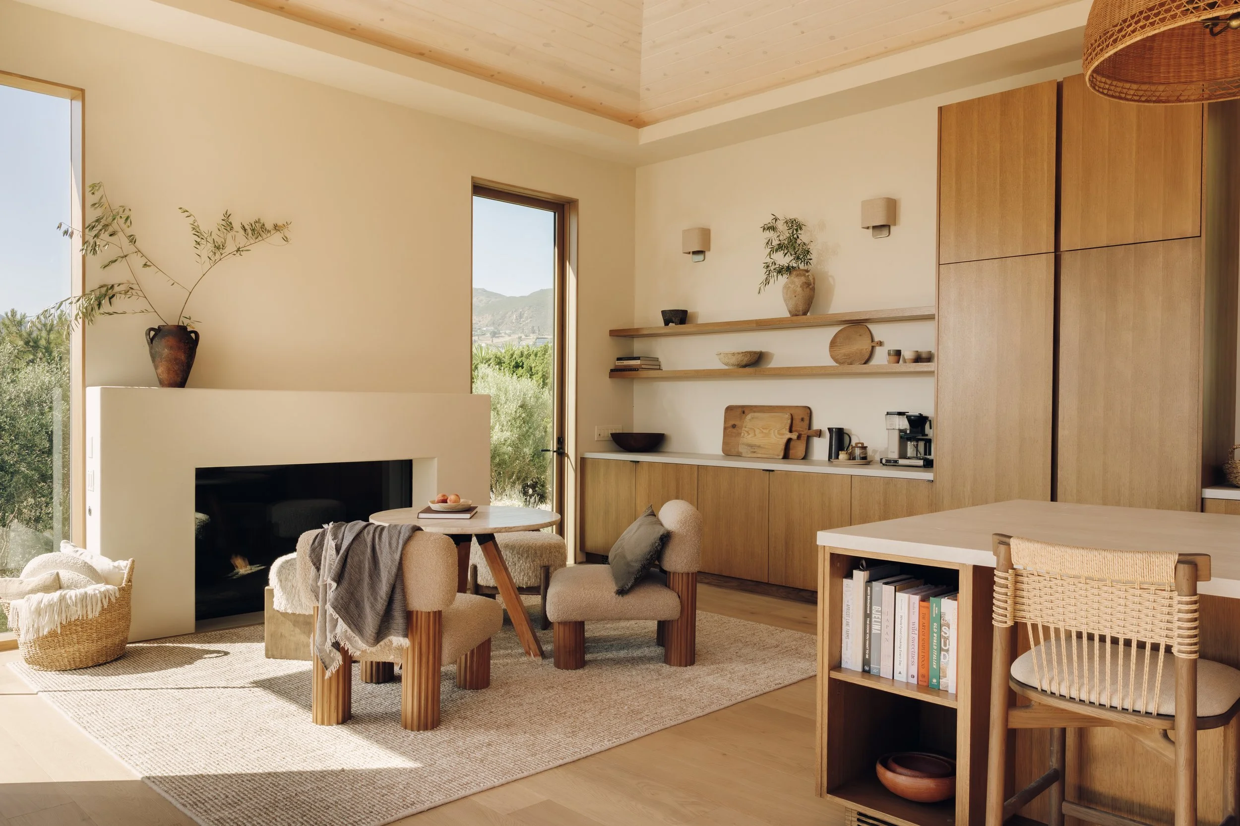 Great room fireplace and seating beside the kitchen