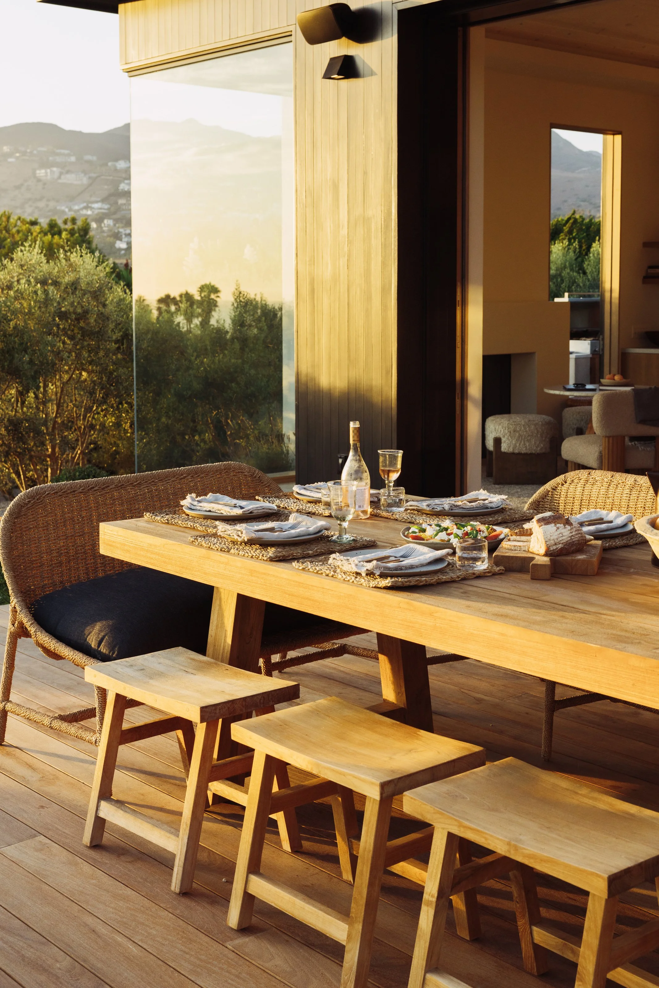 Dining terrace with garden and hillside views