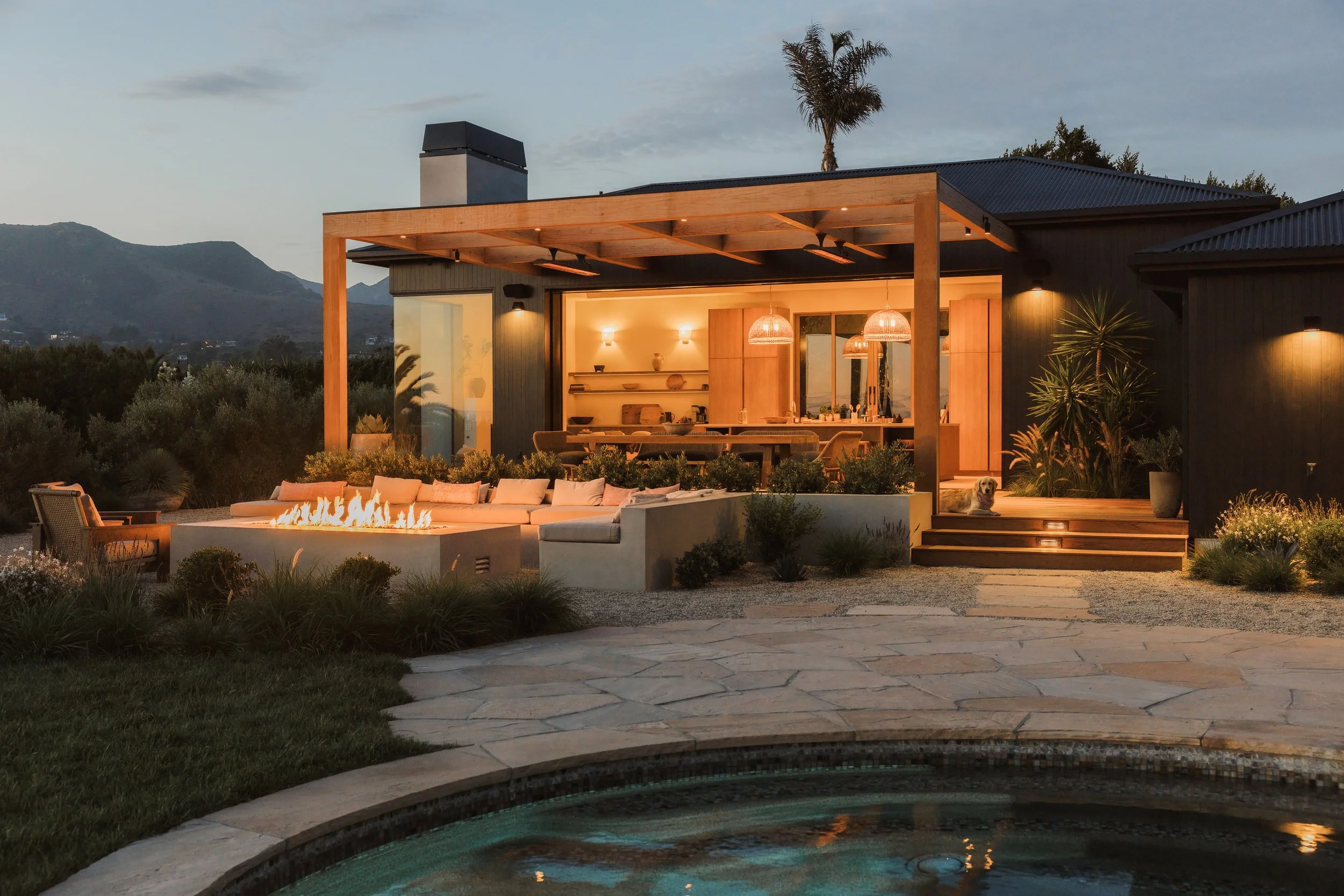 Pool and covered terrace in evening light