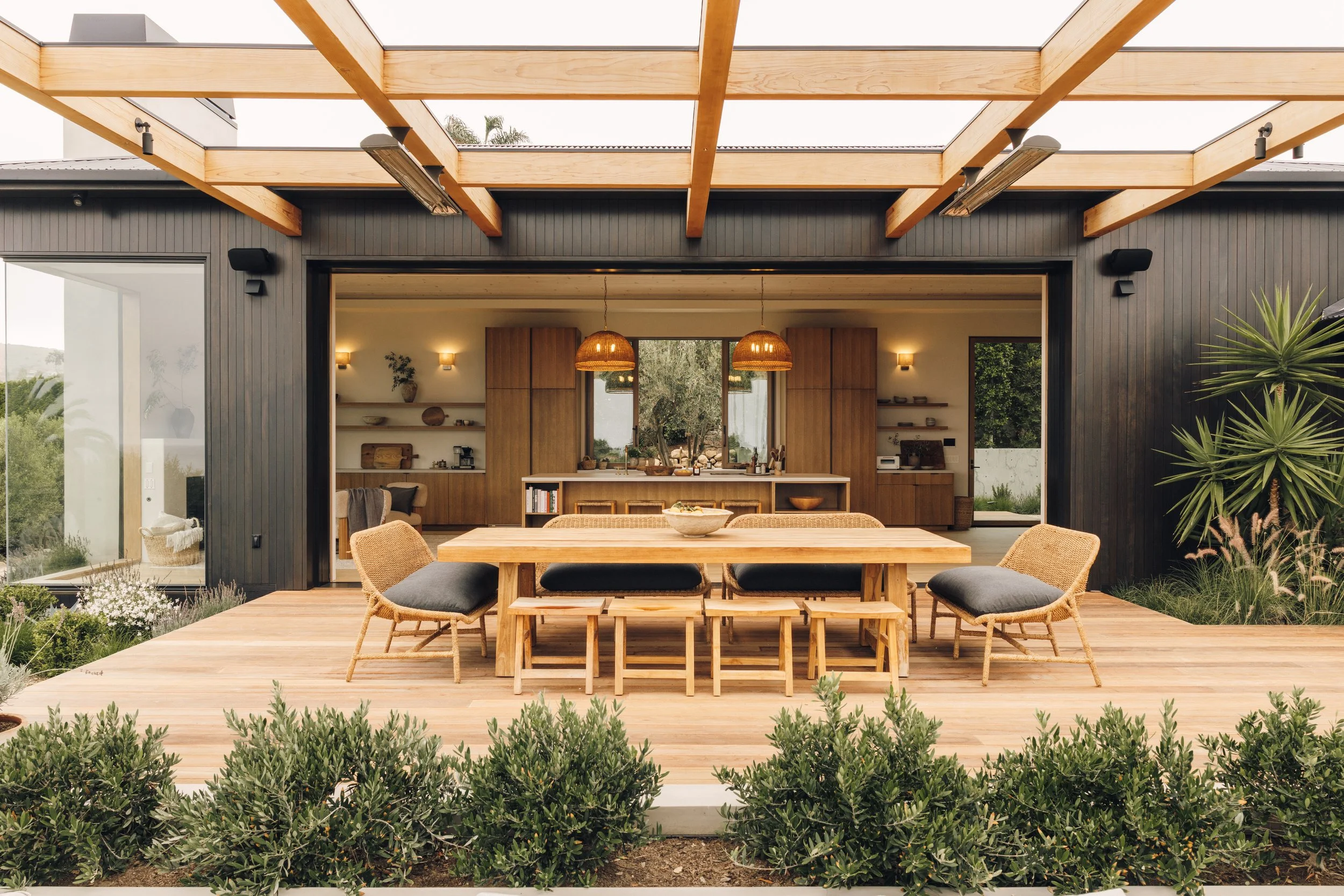 Covered dining terrace opening into the kitchen
