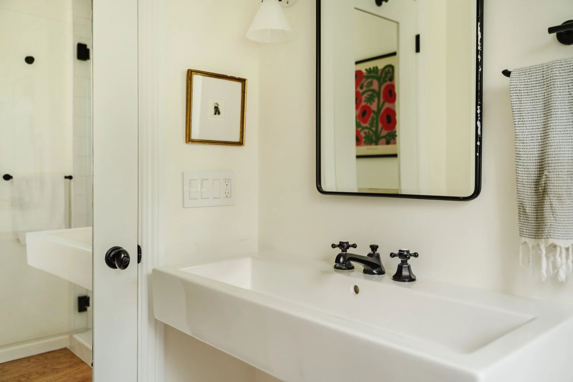 Bathroom — sink, mirror and shower