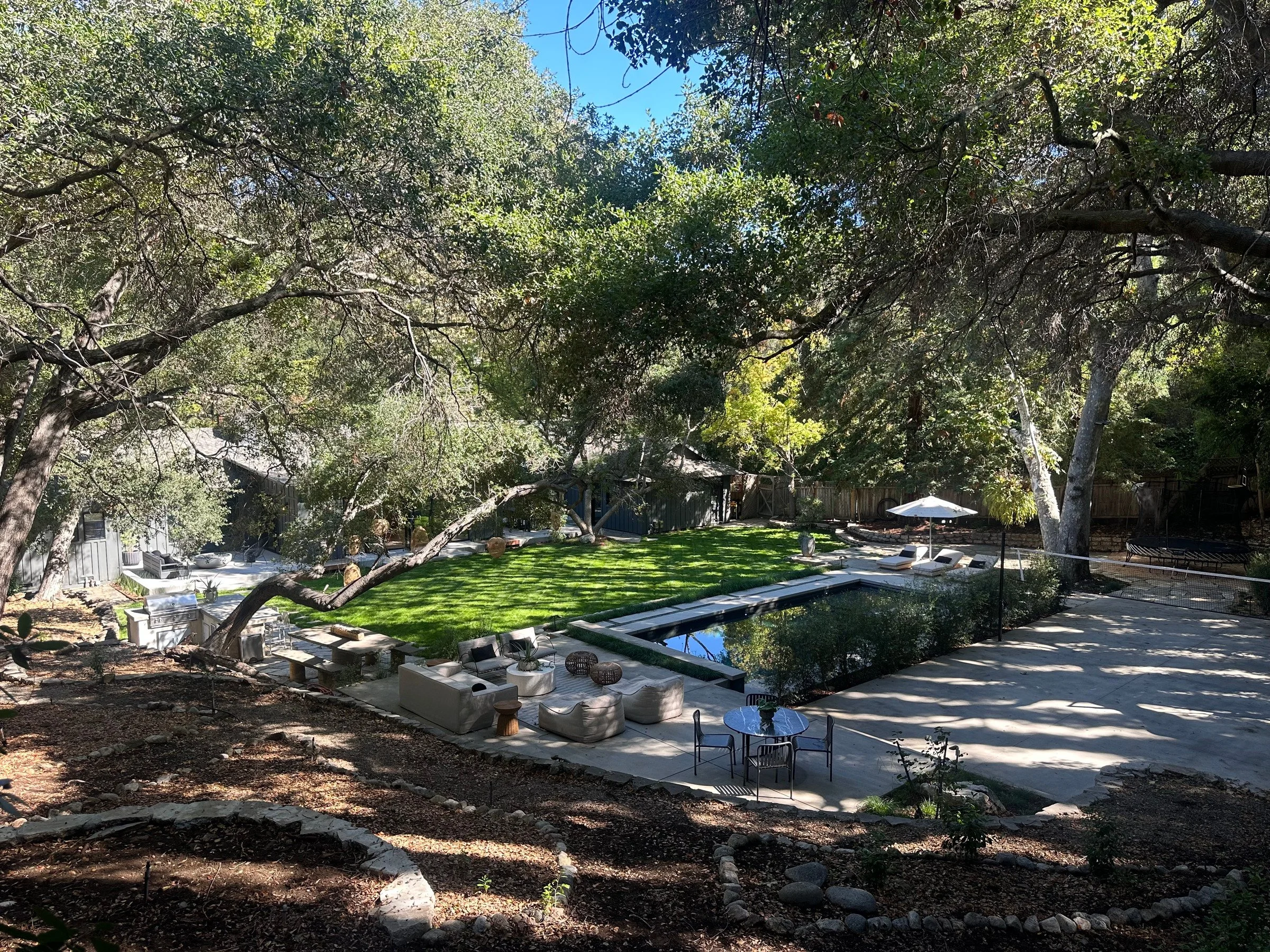 Elevated view of the pool, lawn and sport court. | PL-3803