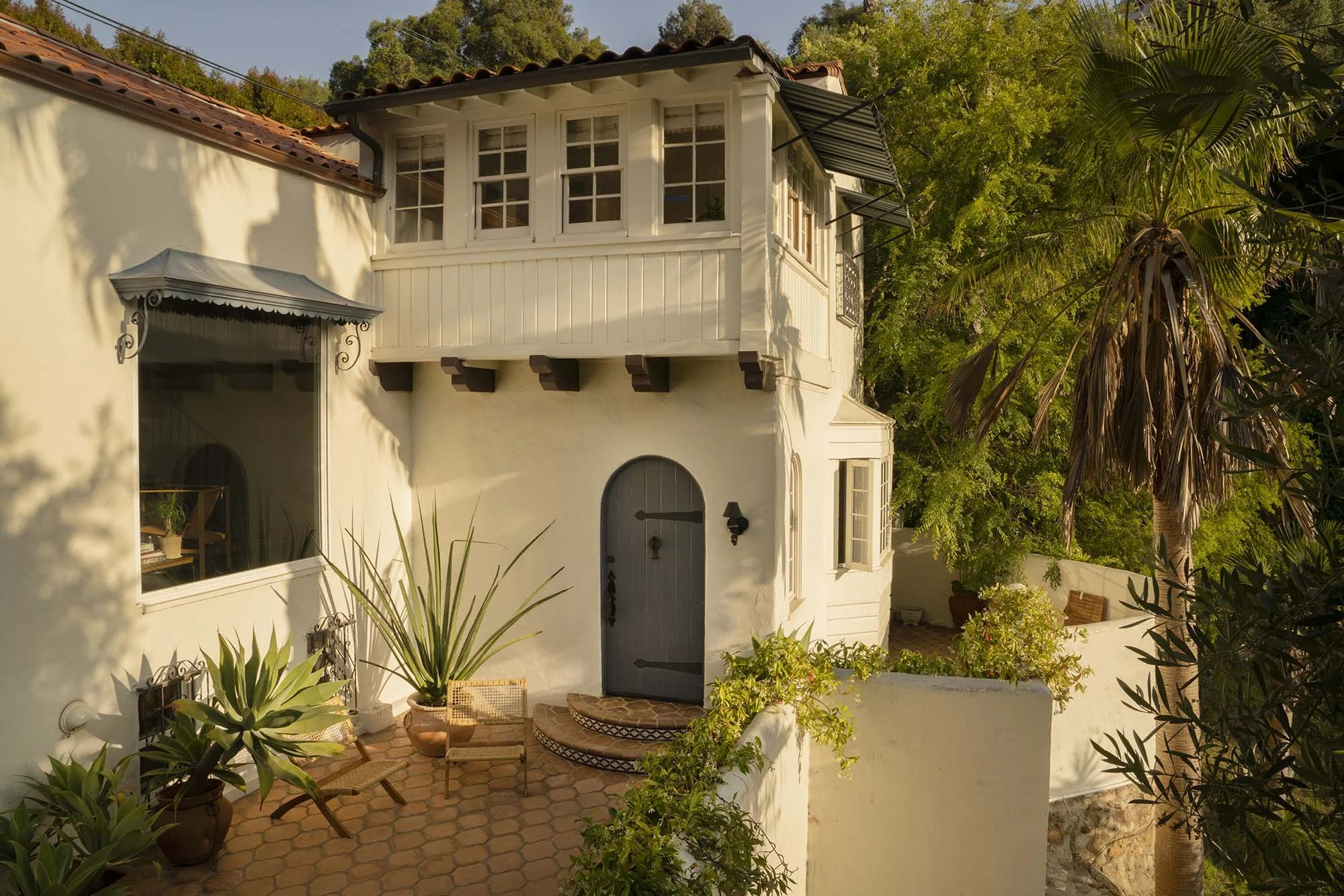 PL6014-002-front-facade-spanish-balcony-arched-door-courtyard.jpg