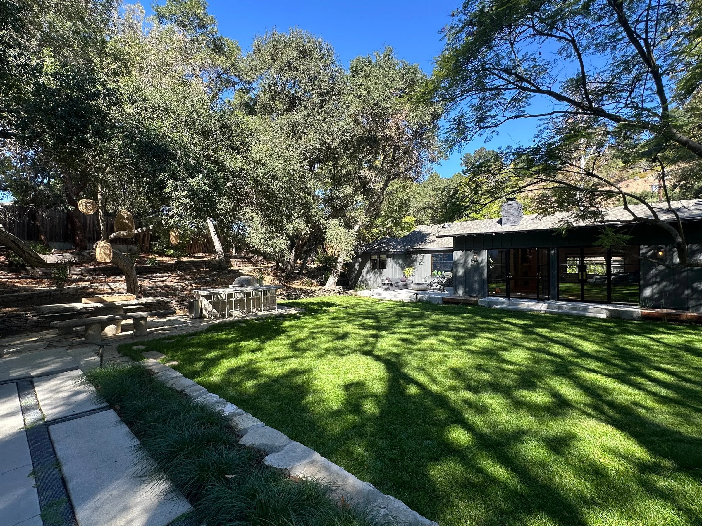 Lawn, rear terrace and outdoor kitchen. | PL-3803