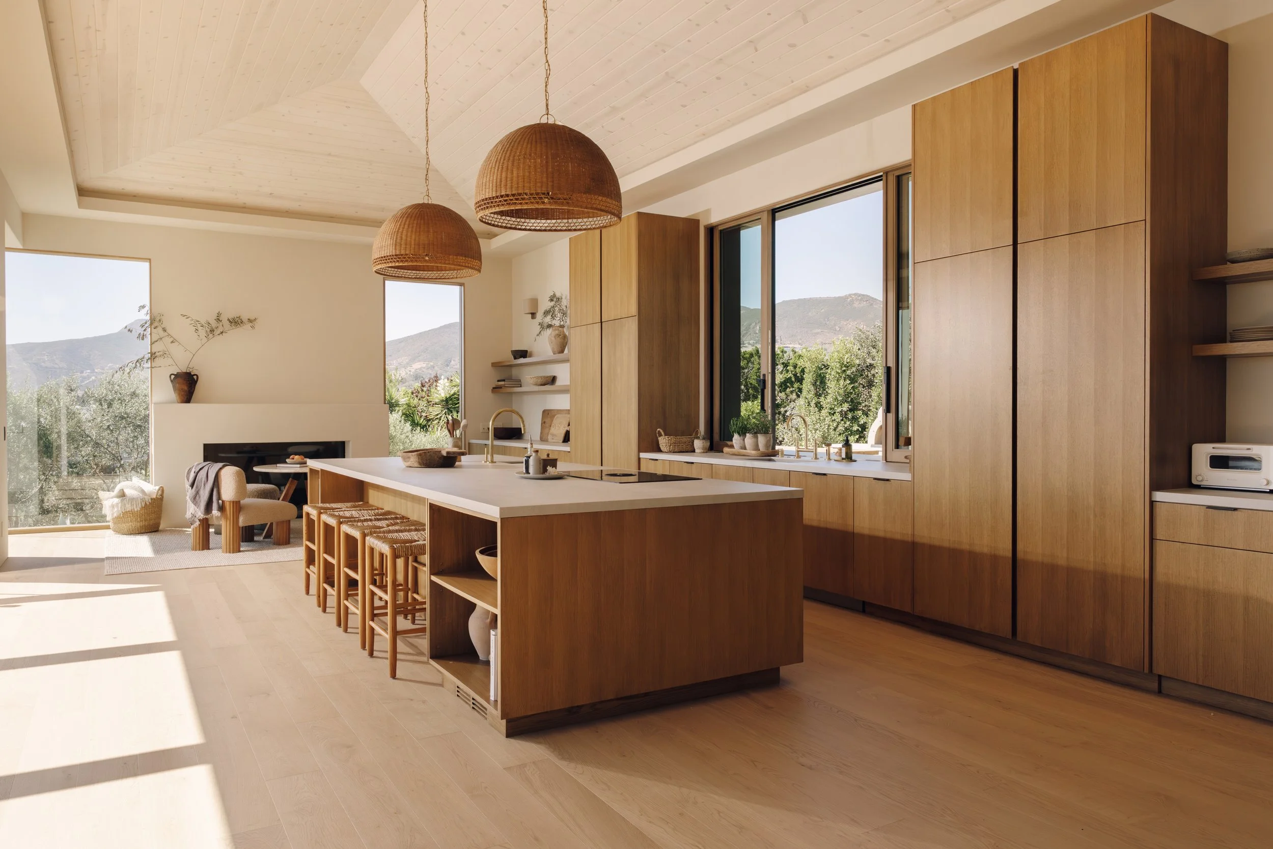 Kitchen with wood island and garden views