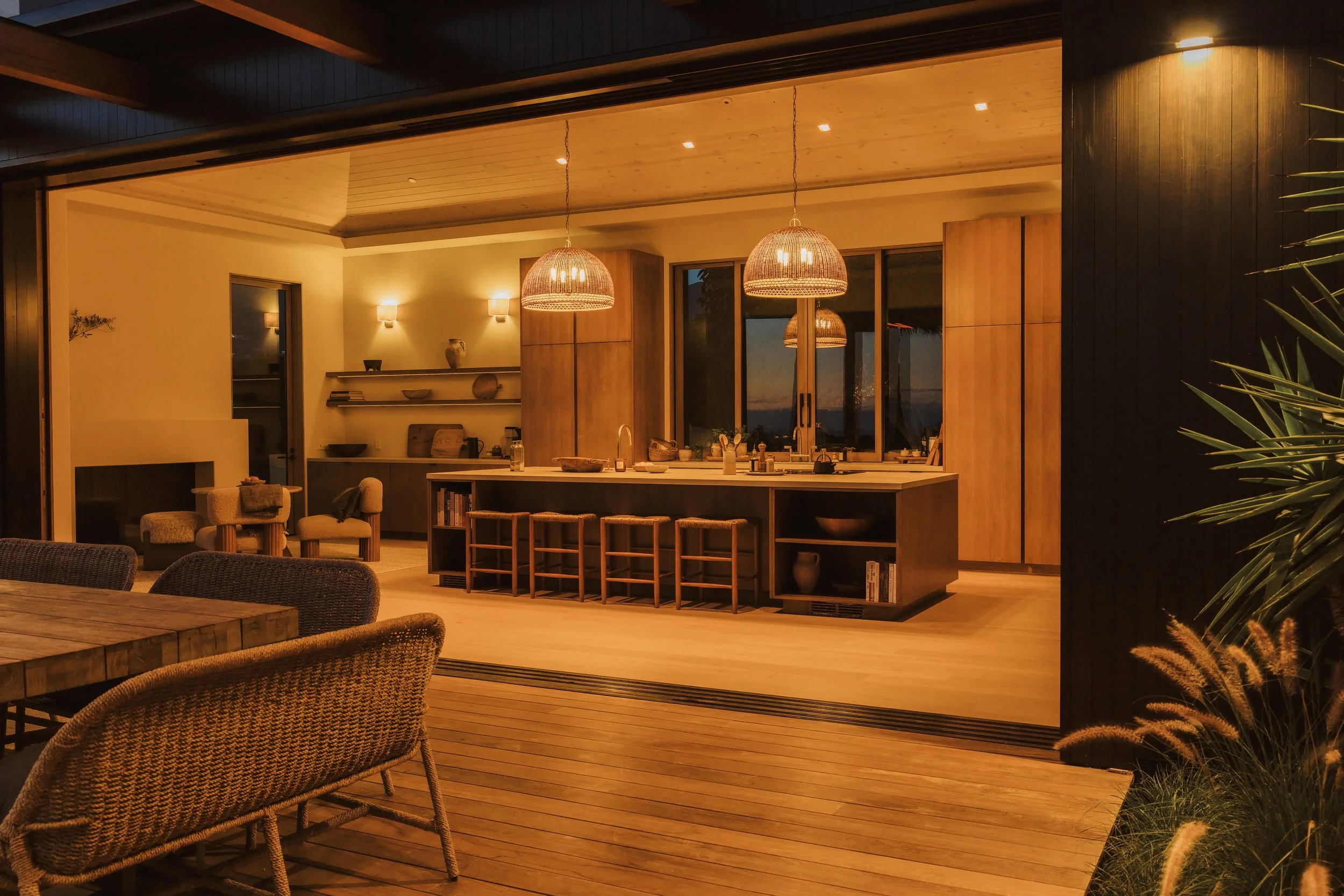Kitchen opening to the terrace at night