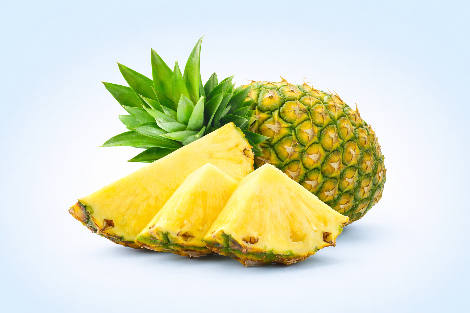 A whole pineapple and three pineapple wedges on a white background.
