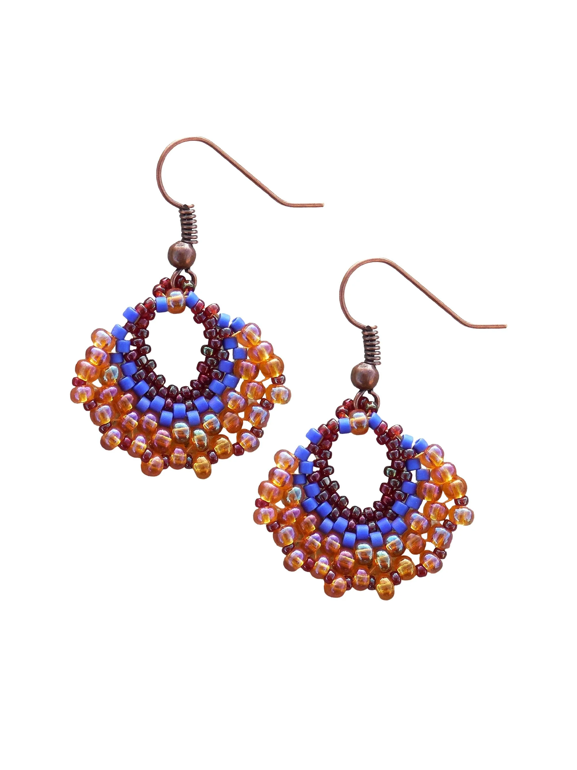 Handmade crescent fan dangle earrings handwoven in red, cobalt blue and orange luster glass seed beads using peyote stitch.