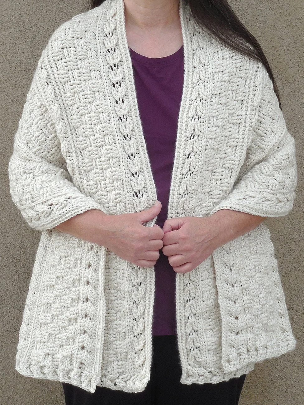 Free crochet Celtic shawl pattern by designer Robin Harley, featuring textured cable arrows.
