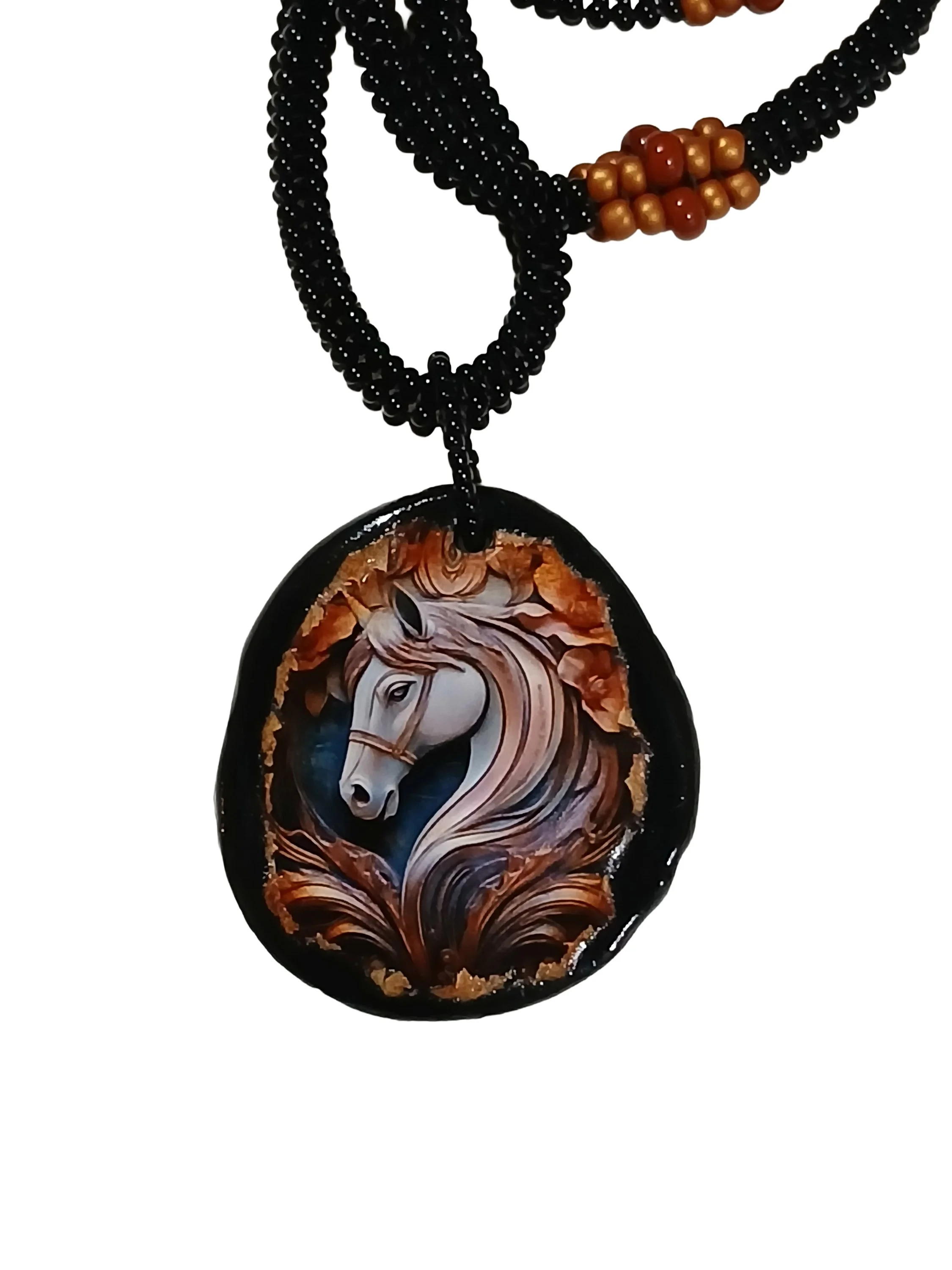 Handmade non-metal beaded rope necklace with horsehead medallion pendant handwoven in black, sienna brown and rust accents and toggle clasp.
