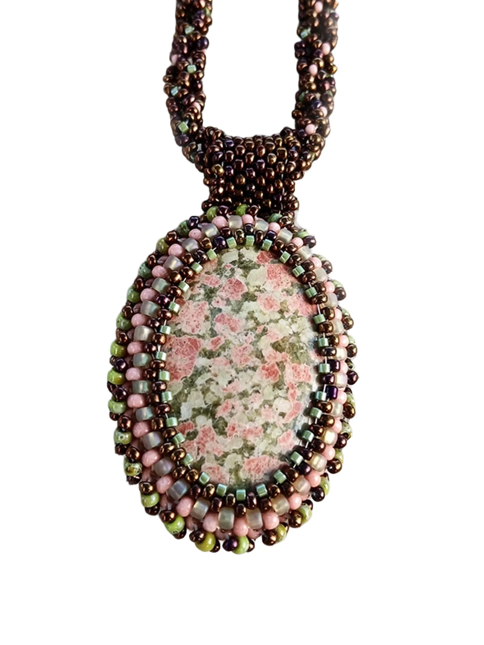 Handmade statement pendant necklace featuring a natural olive green and pink unakite gemstone cabochon handwoven with a matching bronze beaded chain.