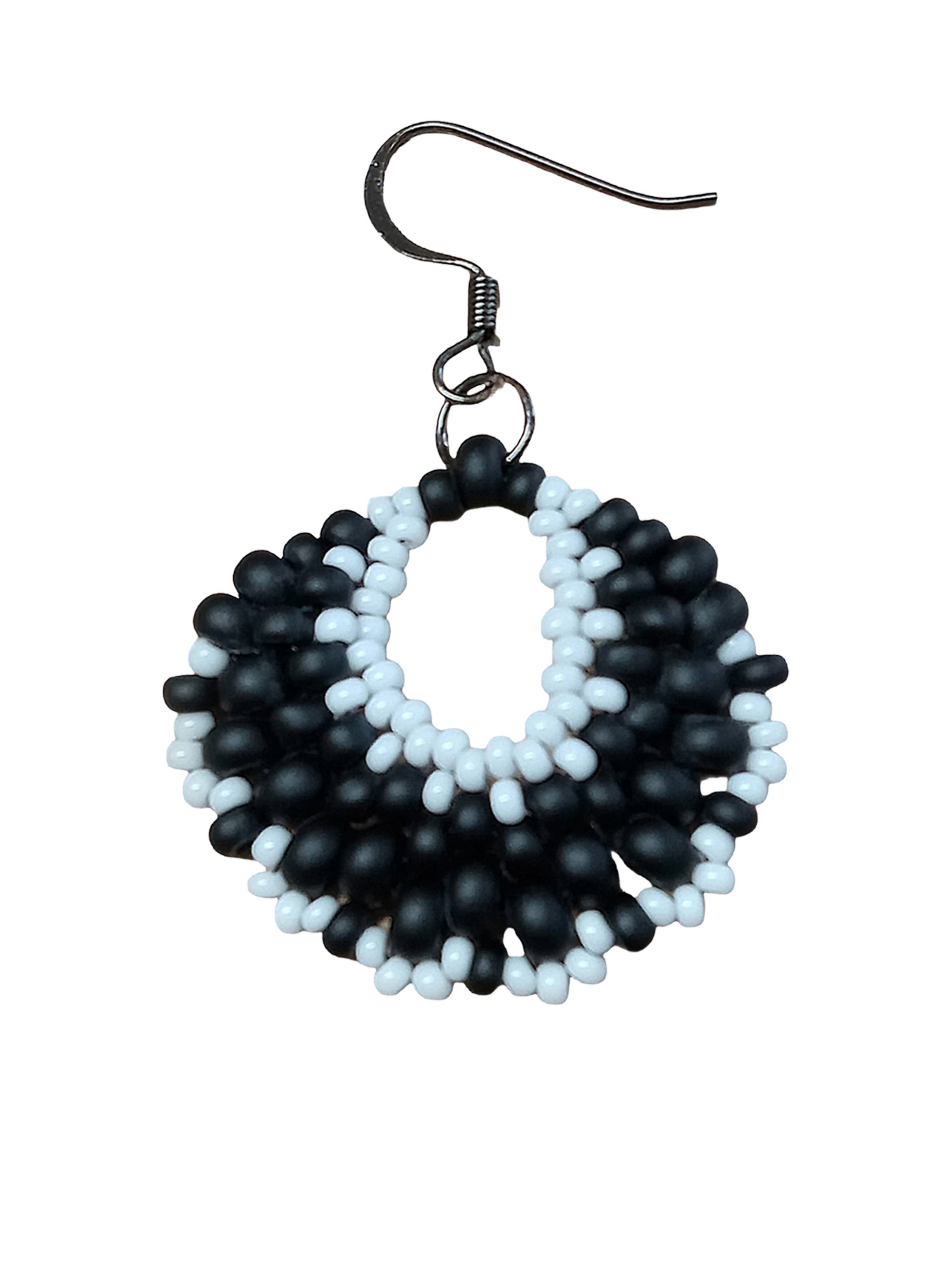 Handmade classic beaded crescent dangle earrings handwoven in black and white glass seed beads using peyote stitch.