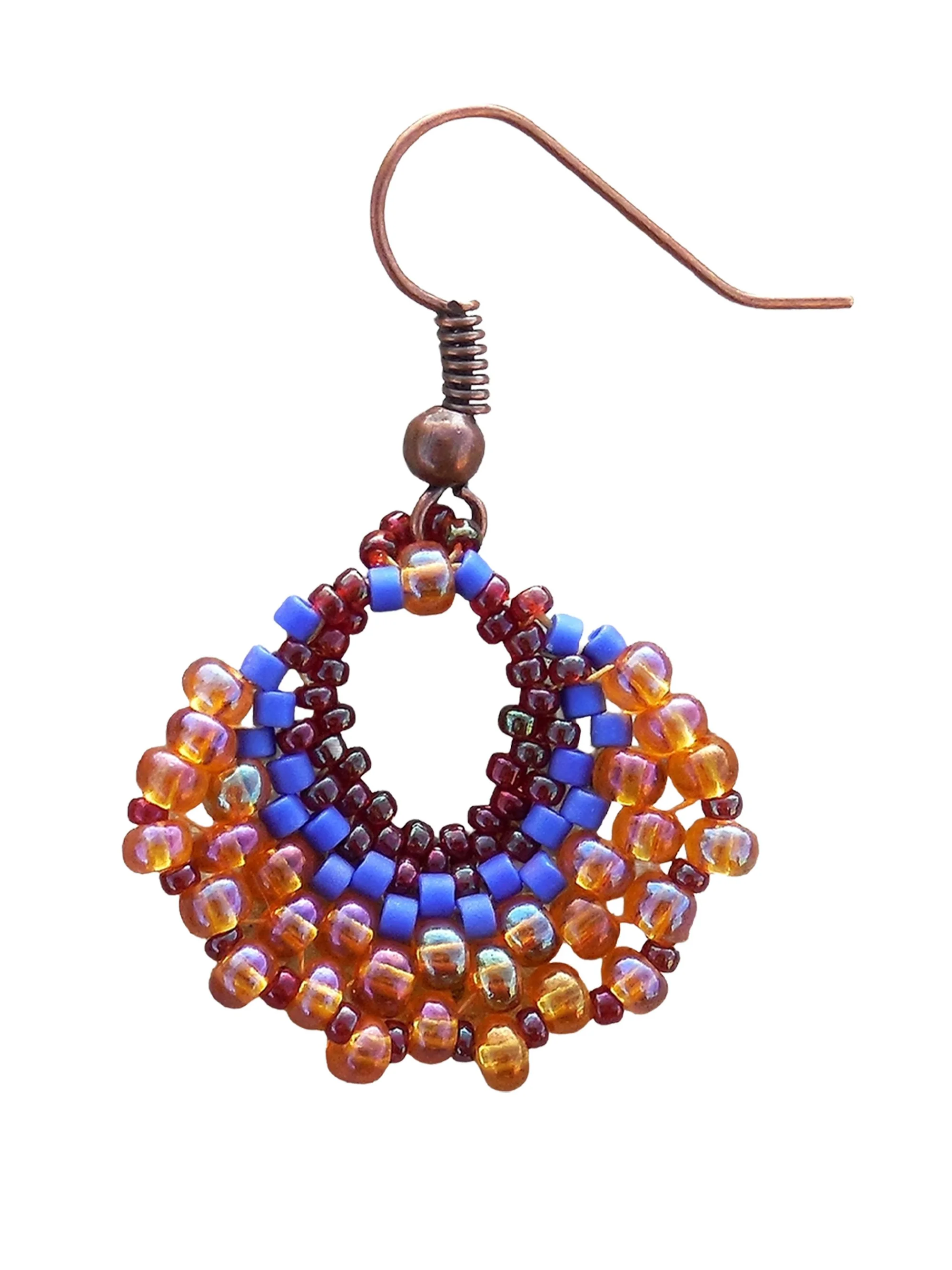 Handmade crescent fan dangle earrings handwoven in red, cobalt blue and orange luster glass seed beads using peyote stitch closeup.