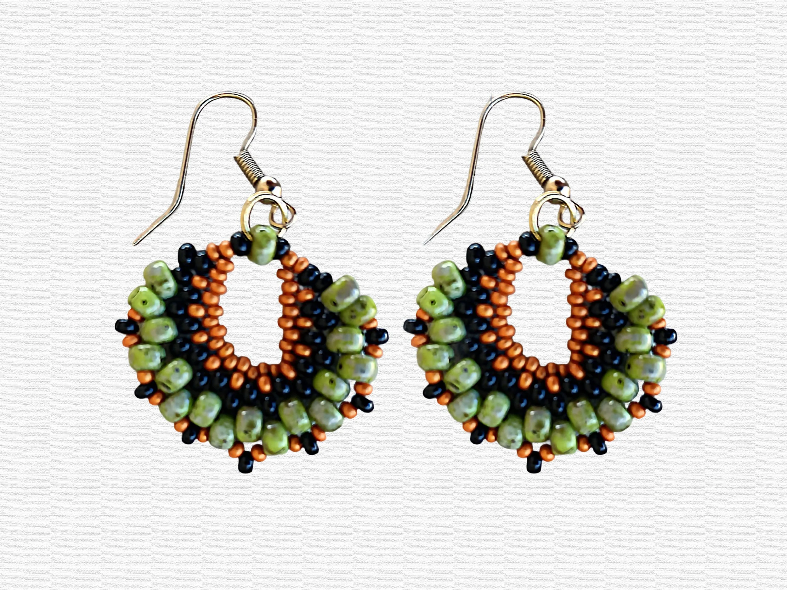 Handmade oval lightweight peyote stitch dangle earrings featuring a seed bead pattern