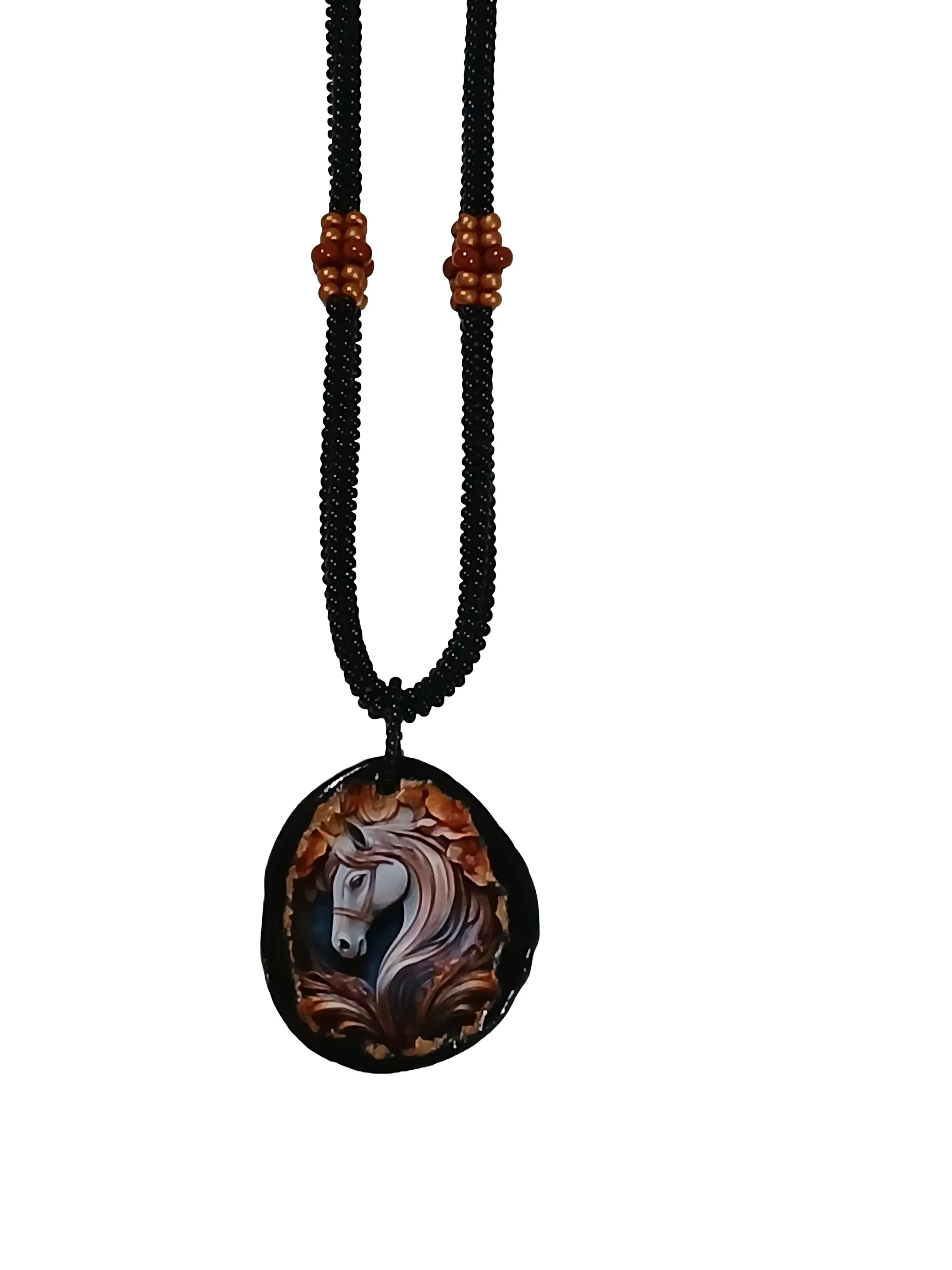 Handmade non-metal beaded rope necklace with horsehead medallion pendant handwoven in black, sienna brown and rust accents and toggle clasp.