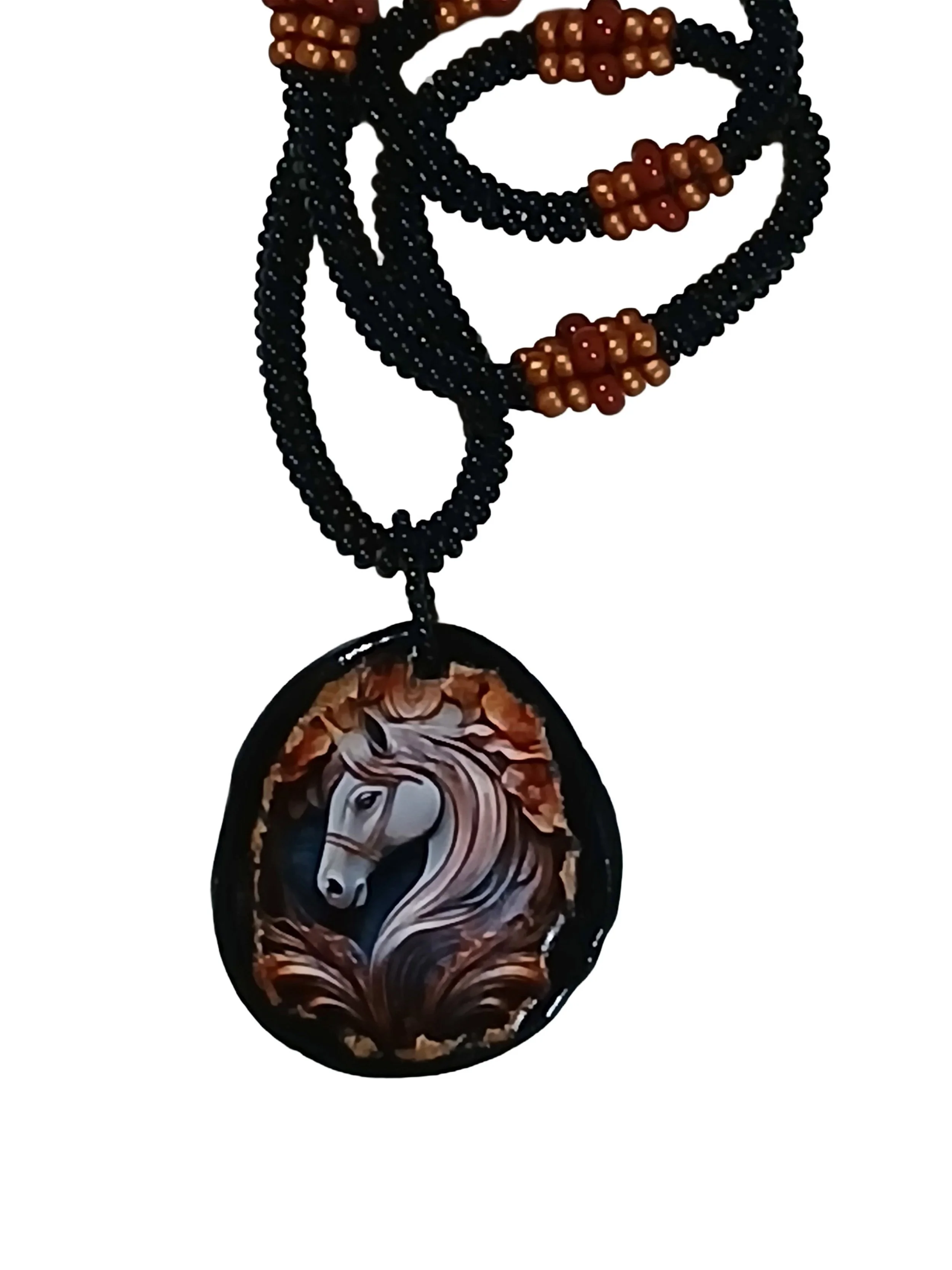 Handmade non-metal beaded rope necklace with horsehead medallion pendant handwoven in black, sienna brown and rust accents and toggle clasp.