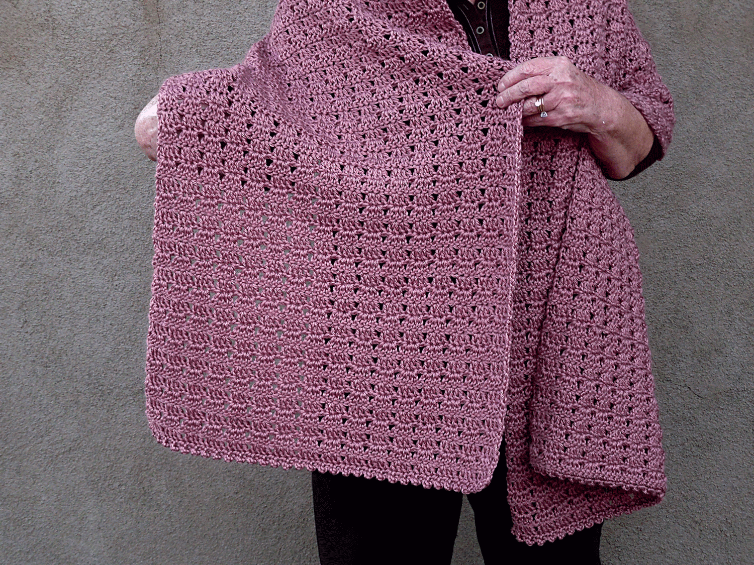 Detailed close-up of the crochet stitches in a rectangle casual wrap by Threaded Flair.