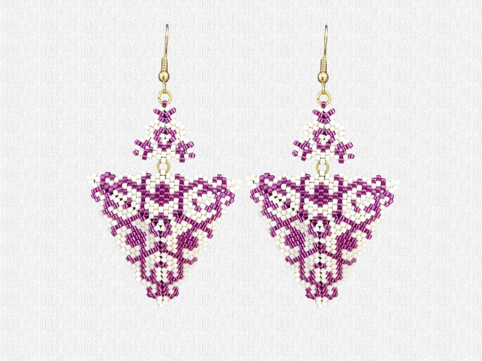 Handmade purple and alabaster white geometric triangle drops with two triangles beaded earrings in handwoven in peyote stitch design.