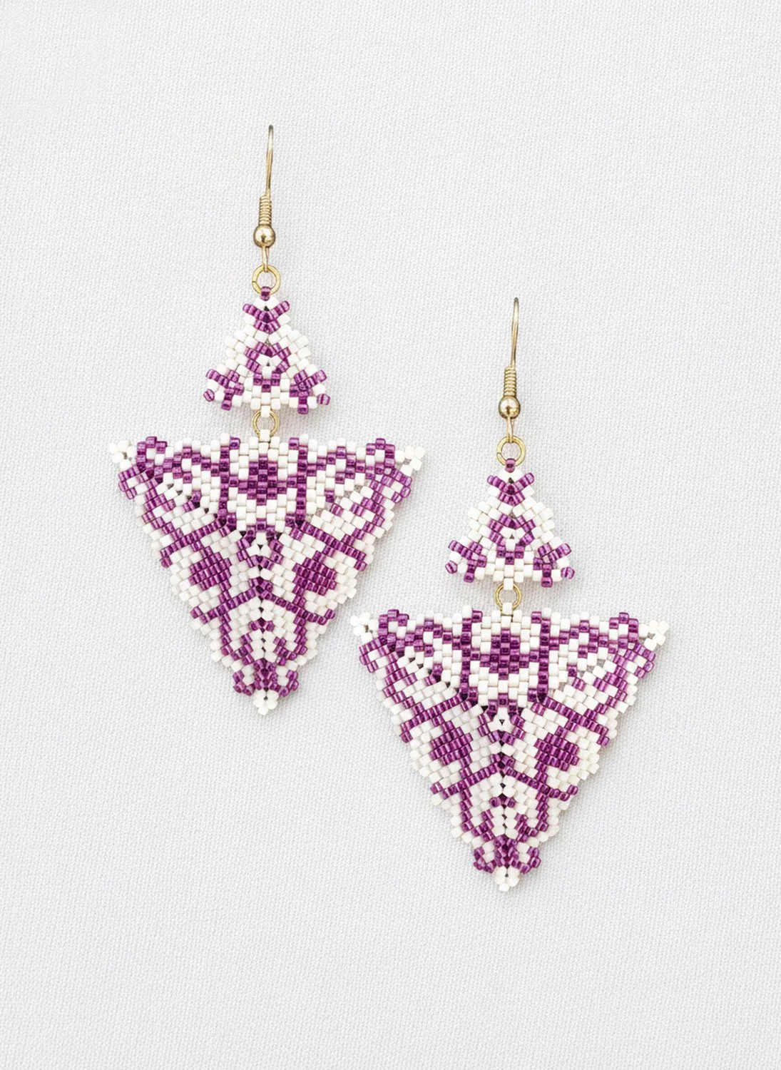 Handmade purple and alabaster white geometric triangle drops with two triangles beaded earrings in handwoven in peyote stitch design.