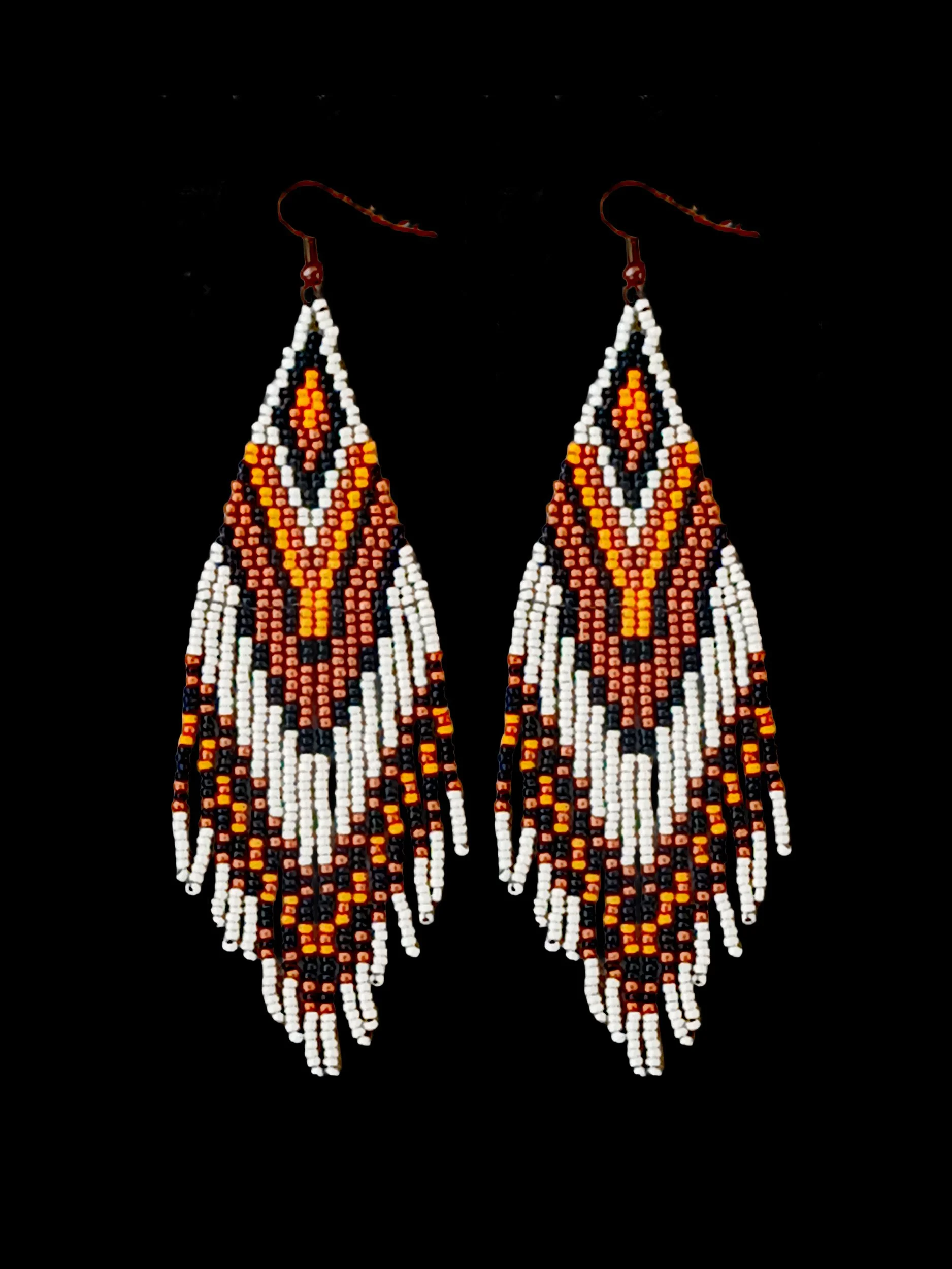 Handmade 5" sunset orange and black beaded fringe earrings handwoven with accents of rich copper, and matte silver beads.