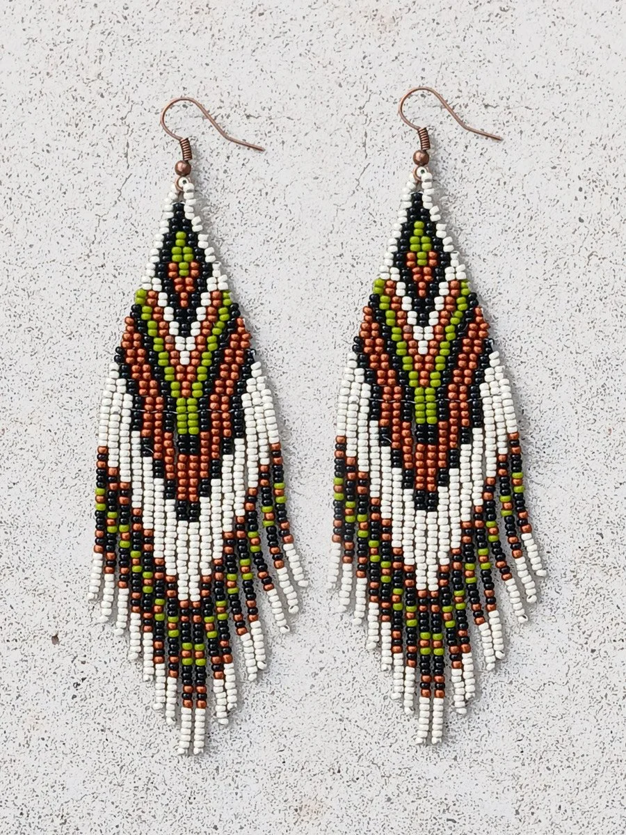 Handmade 5” beaded fringe earrings handwoven in chevron brick stitch with earthy green, matte silver, black, and copper.