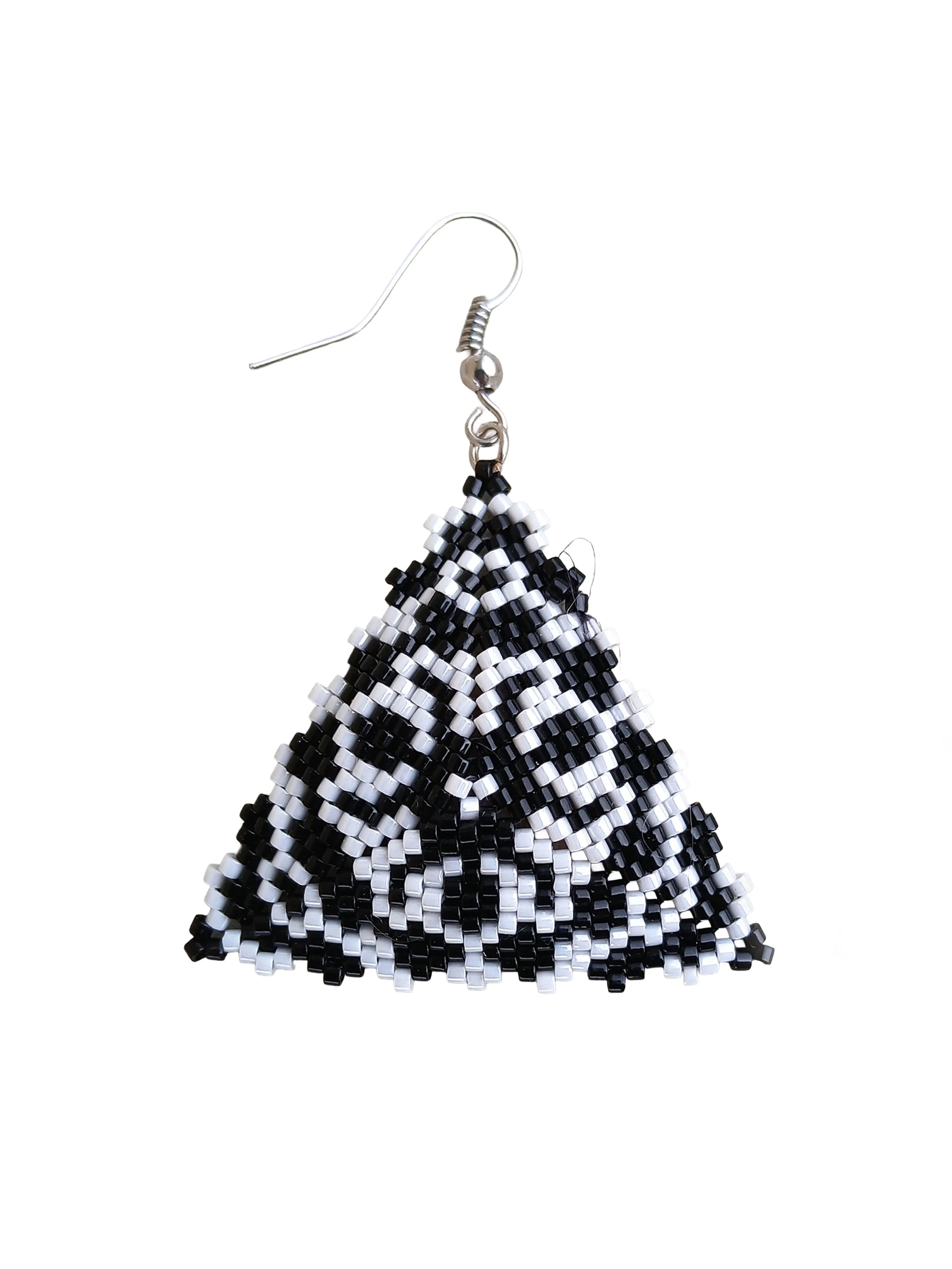 Handmade geometric triangle beaded earrings featuring an abstract lion face design handwoven in black and white peyote.