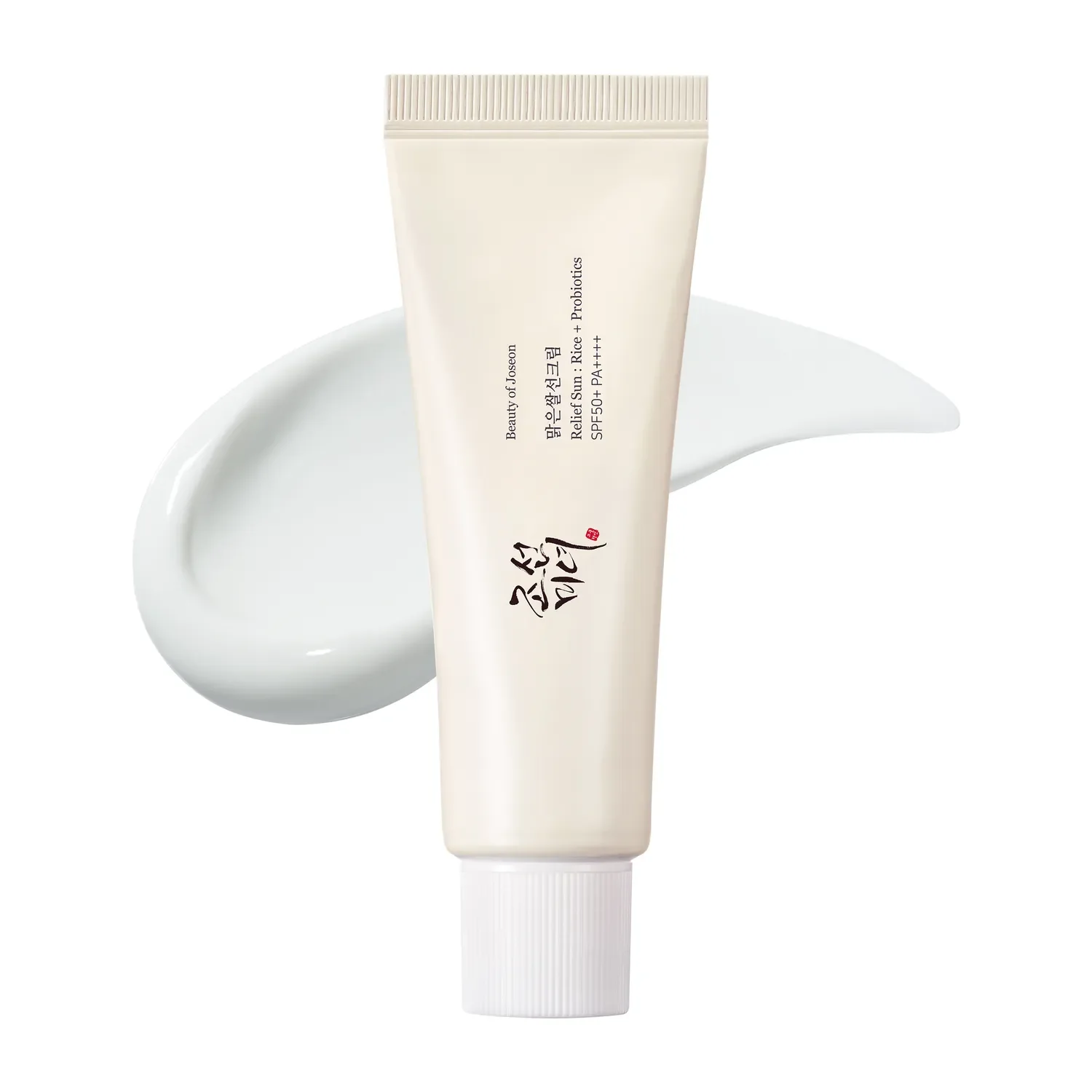 A tube of Korean sunscreen labeled 'Relief Sun: Rice + Probiotics SPF50+ PA++++' with a small amount of white cream on a white surface.