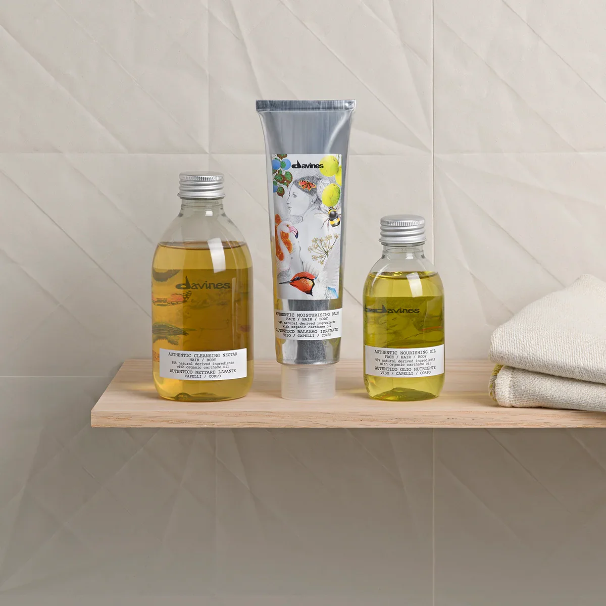 Davines-authenticgroup-74030-cleansing-nectar-74011-moisturising-balm-74012-nourishing-oil-situational_2000x.webp