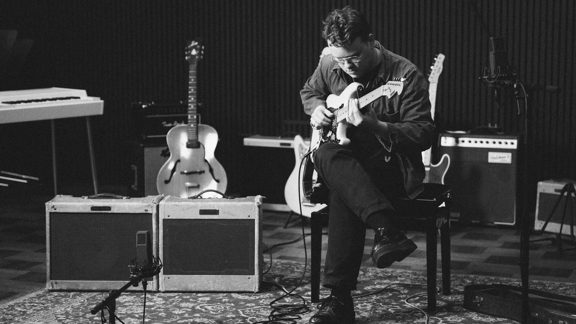 Johan Borgh playing electric guitar at IMRSV Studios.