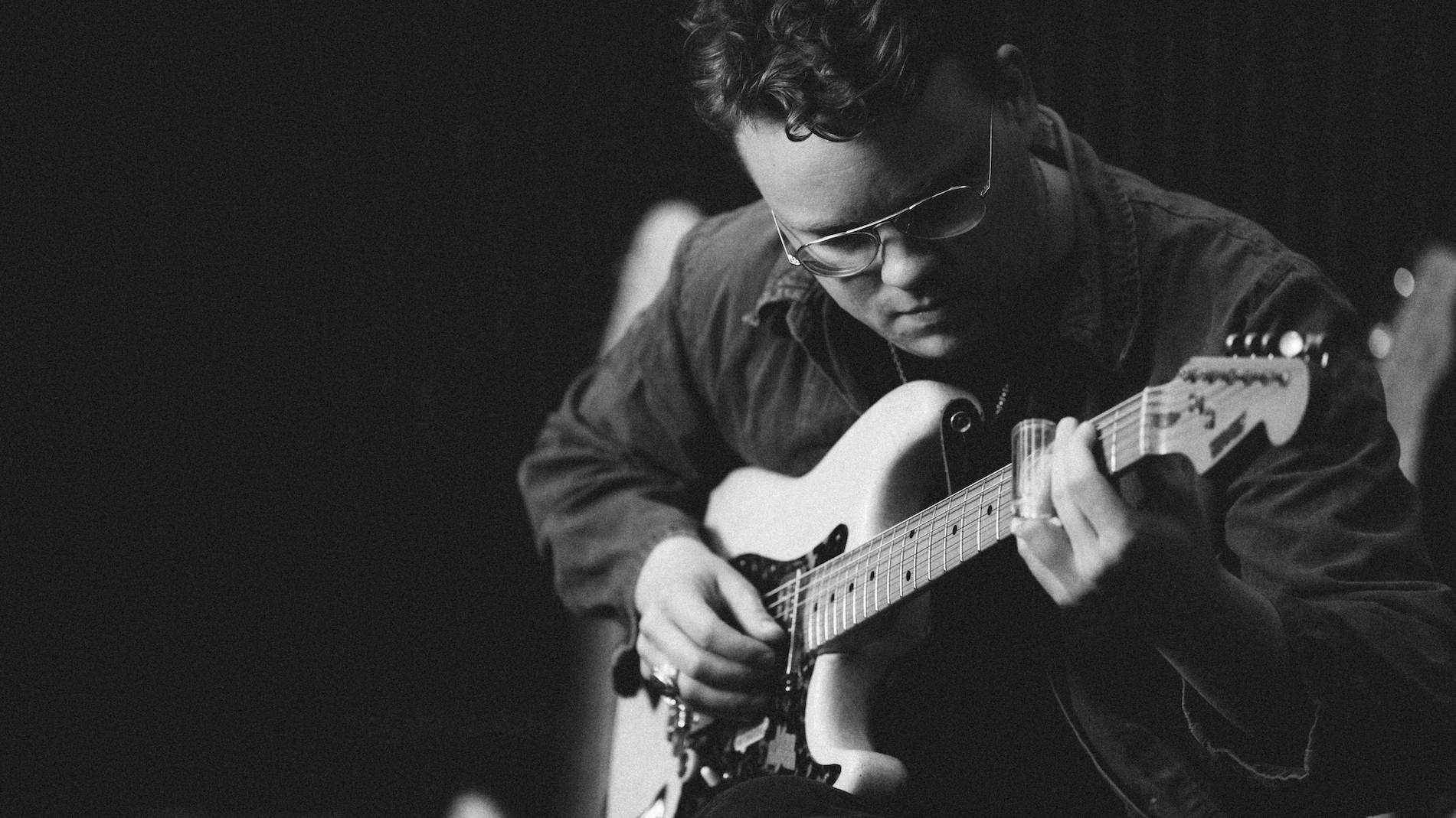 Johan Borgh playing electric guitar at IMRSV Studios.