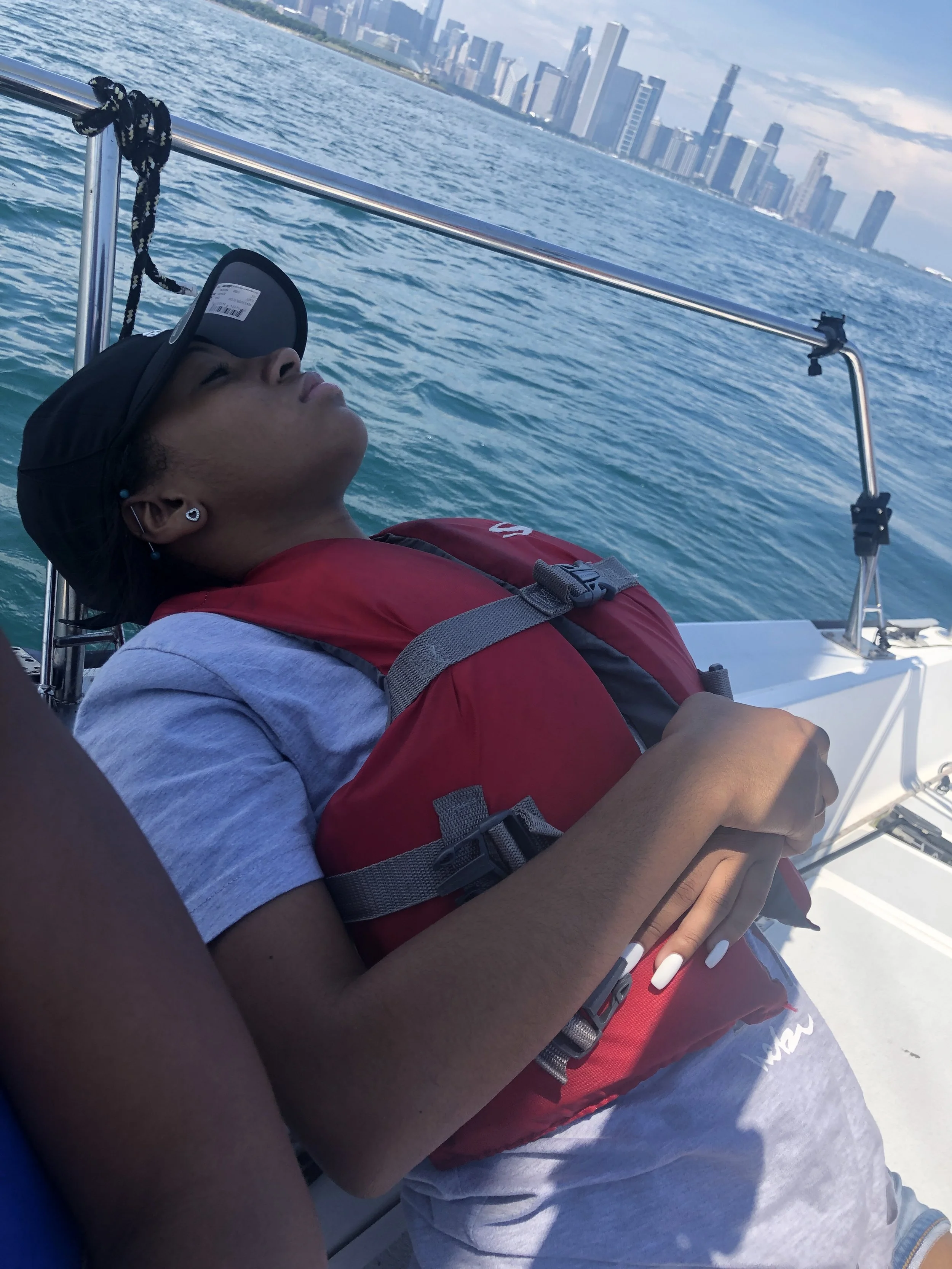 Girl relaxing on a boat in Chicago