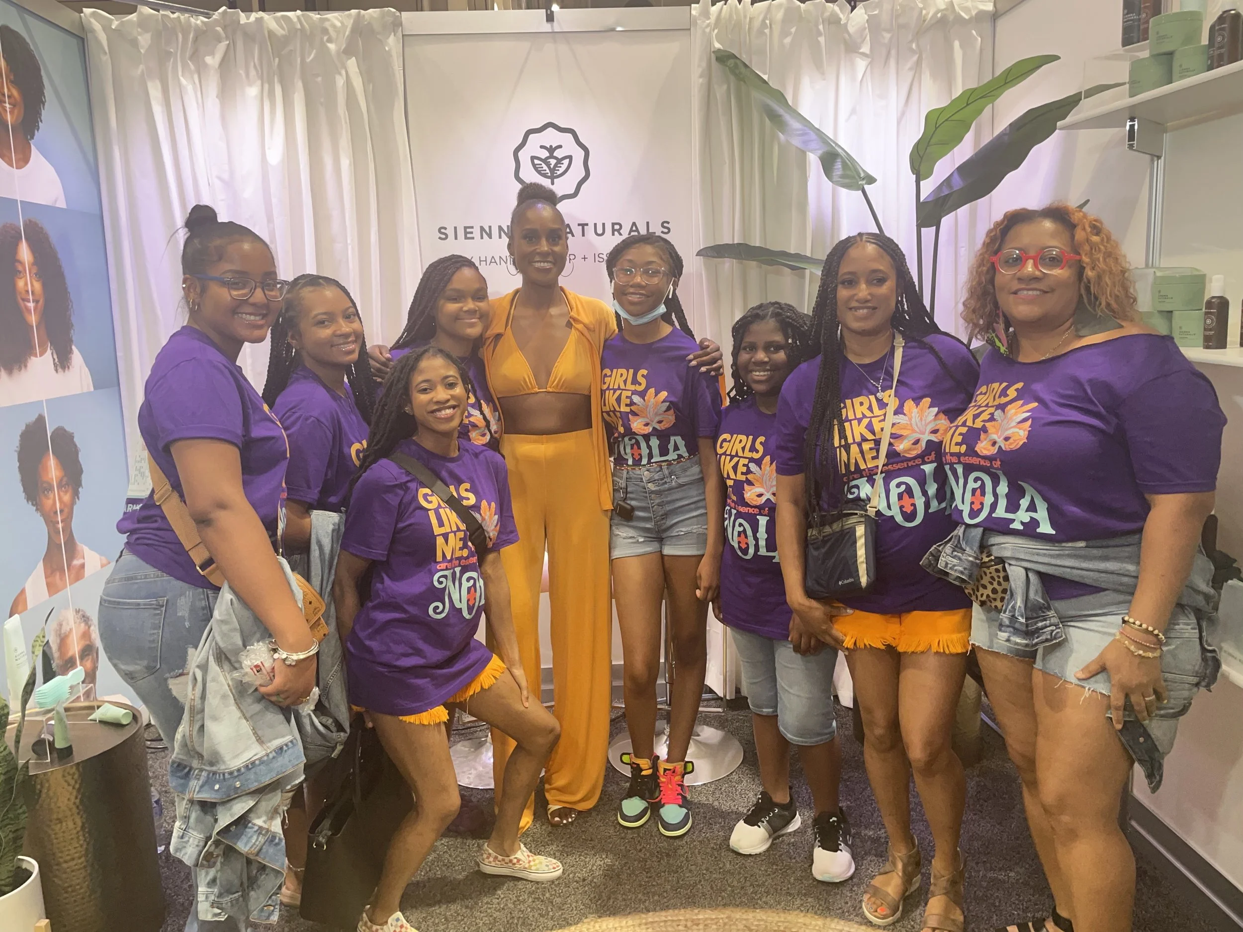 GLMPI girls posing for a photo with celebrity, Issa Rae