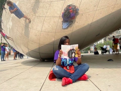 Young girl reading a book