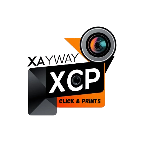 Logo for XAYWAY XCP Click & Prints featuring a camera lens and text in black, orange, and white.